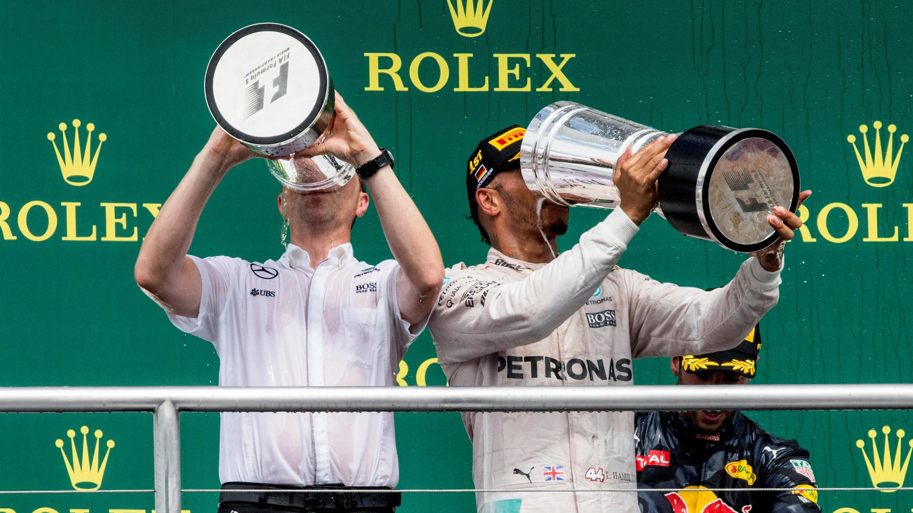 Race winner Lewis Hamilton (GBR) Mercedes AMG F1 celebrates on the podium with the champagne and