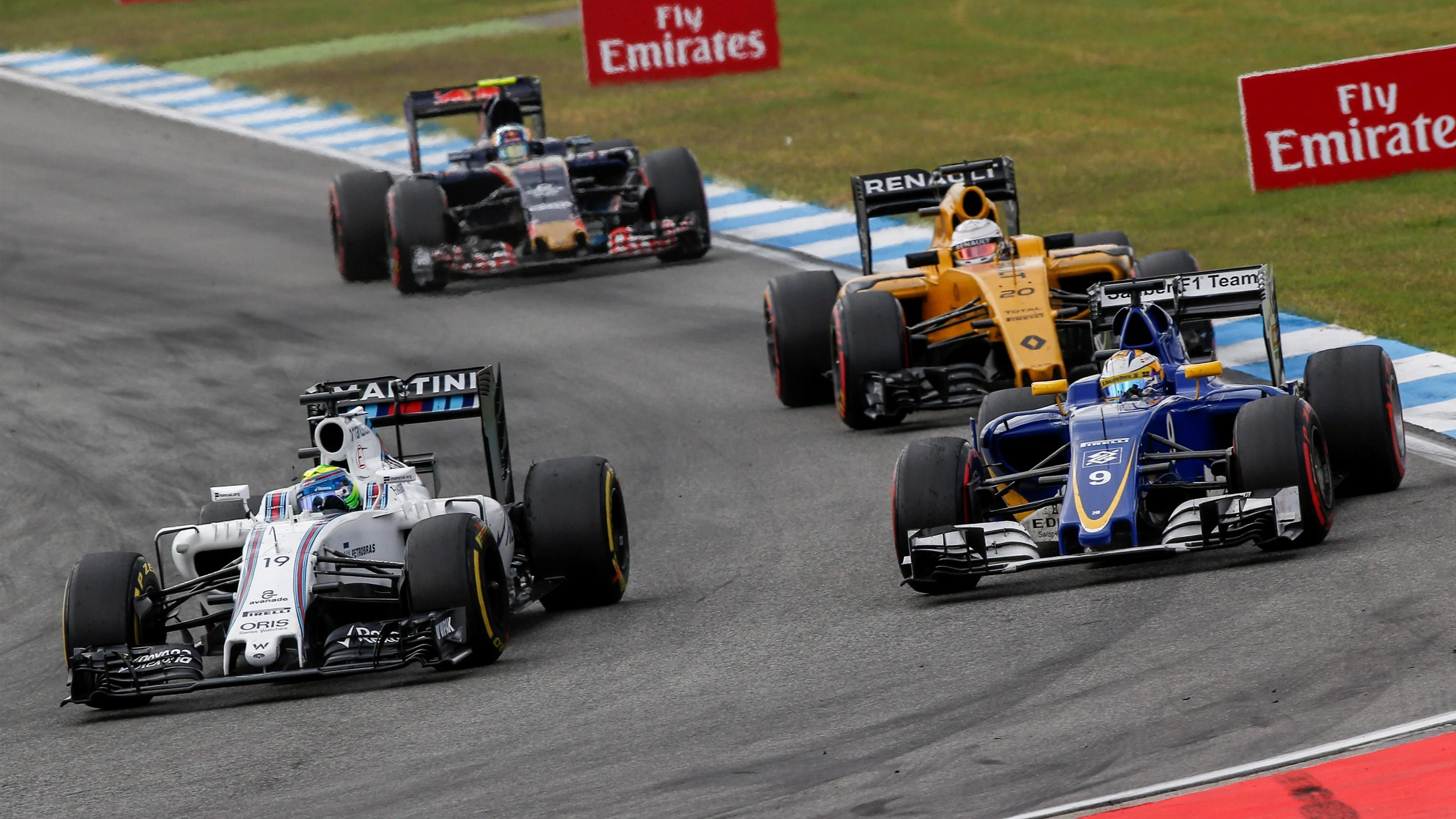 Felipe Massa (BRA) Williams FW38 and Marcus Ericsson (SWE) Sauber C35 at Formula One World