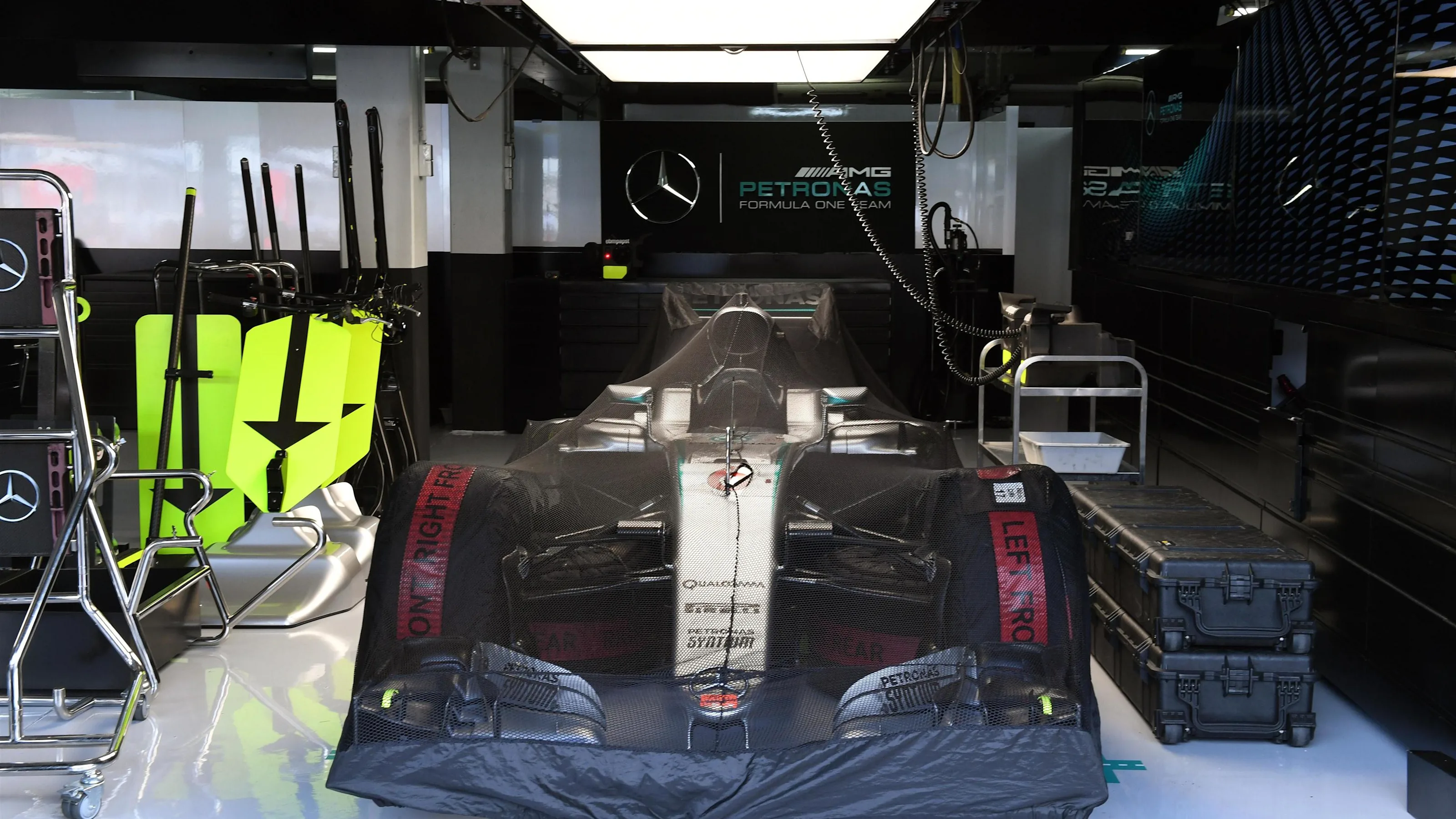 Mercedes-Benz F1 W07 Hybrid under covers in the garage at Formula One World Championship, Rd12,