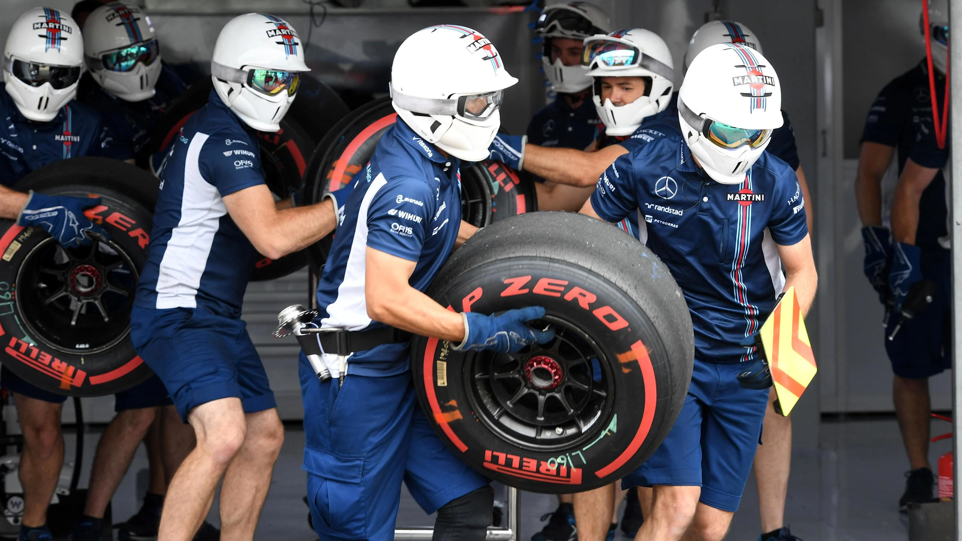 Williams mechanics and Pirelli tyres at Formula One World Championship, Rd12, German Grand Prix,