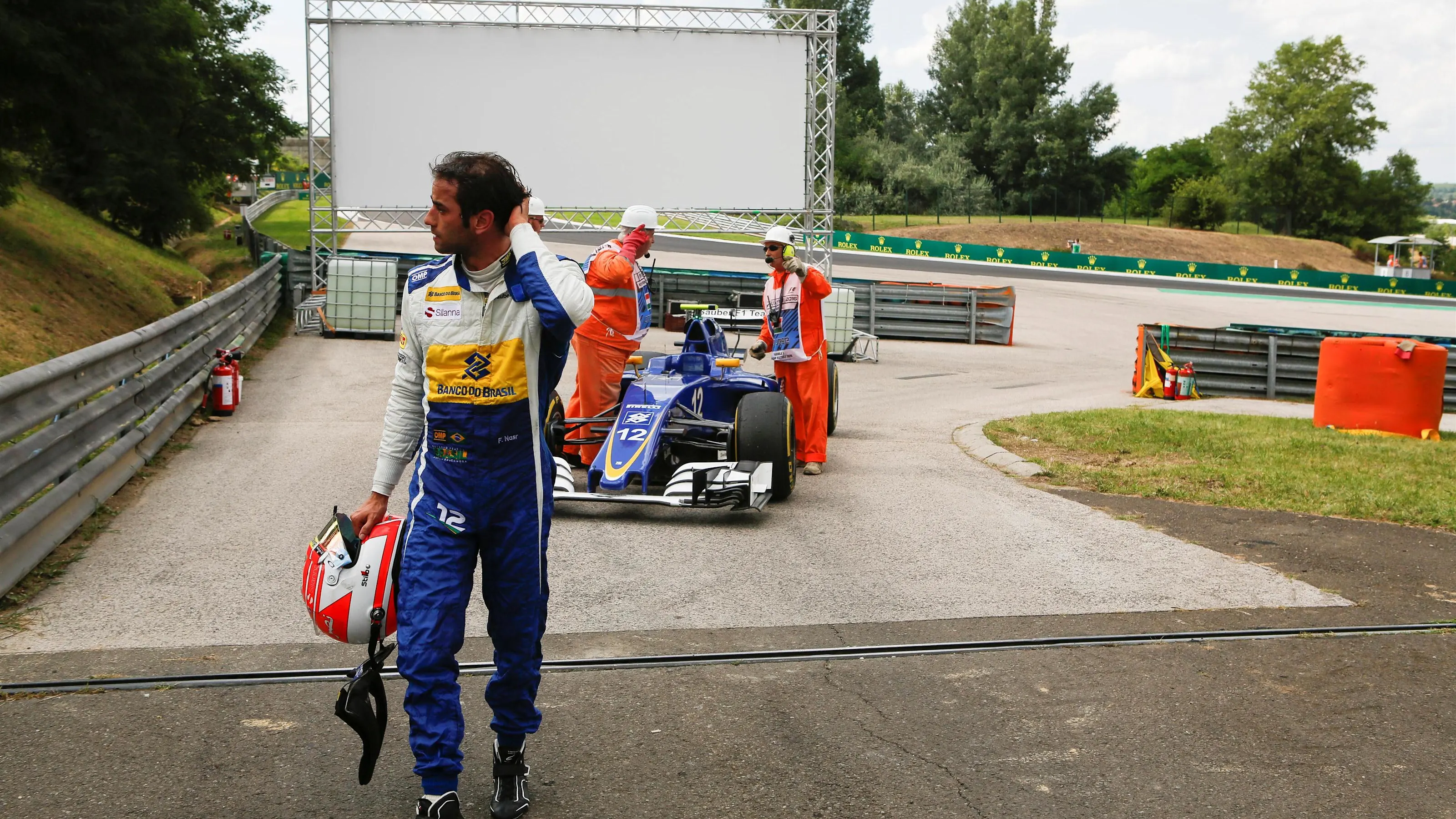 The car of Felipe Nasr (BRA) Sauber C35 is recovered by Marshals after stopping on track in FP2 at