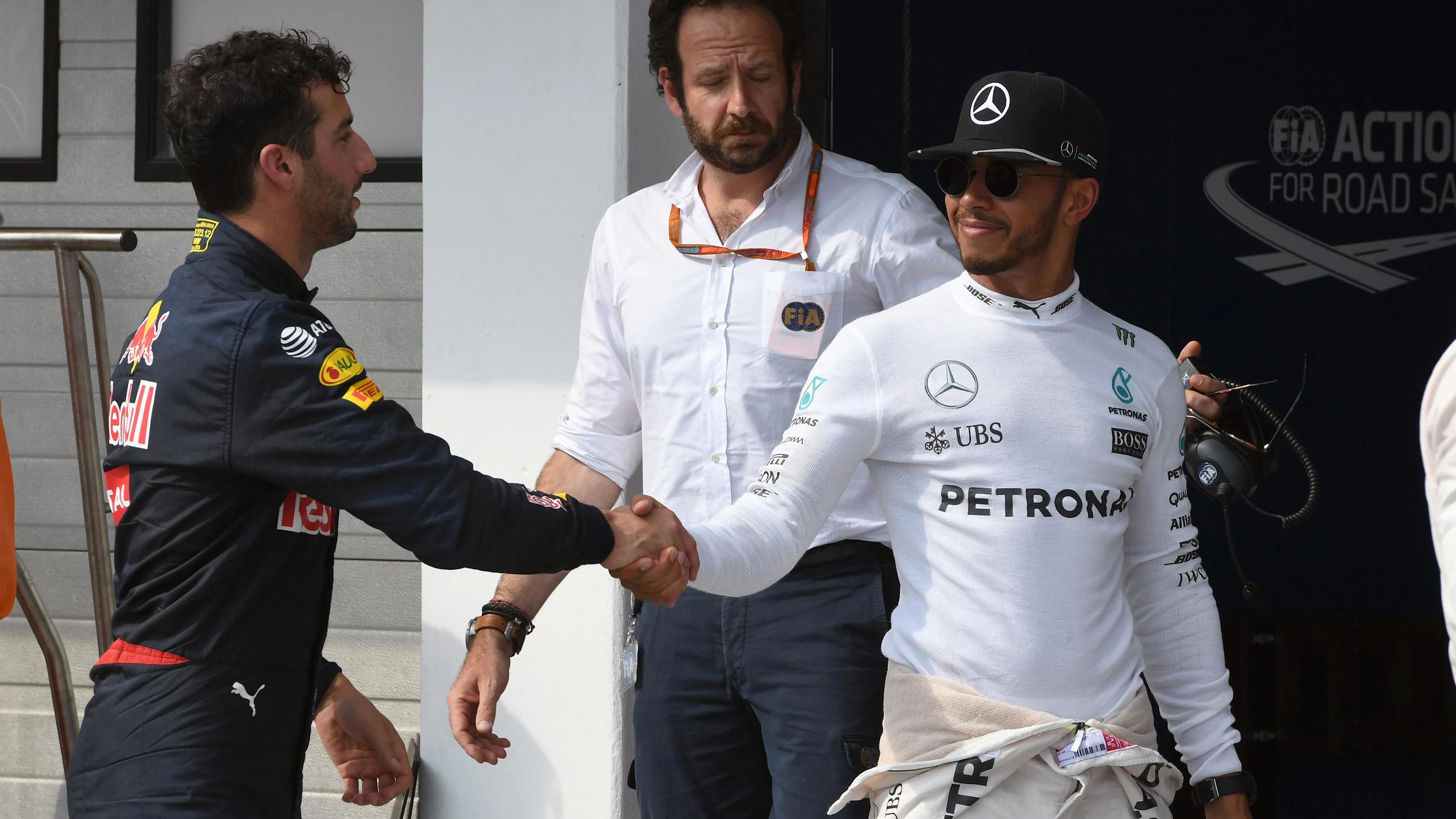 Daniel Ricciardo (AUS) Red Bull Racing and Lewis Hamilton (GBR) Mercedes AMG F1 celebrate in parc
