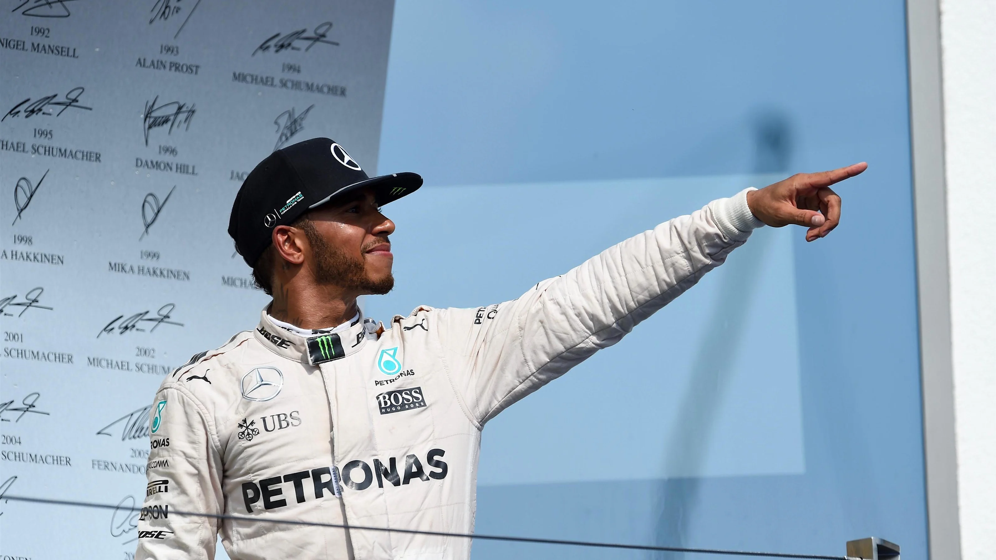 Race winner Lewis Hamilton (GBR) Mercedes AMG F1 celebrates on the podium at Formula One World