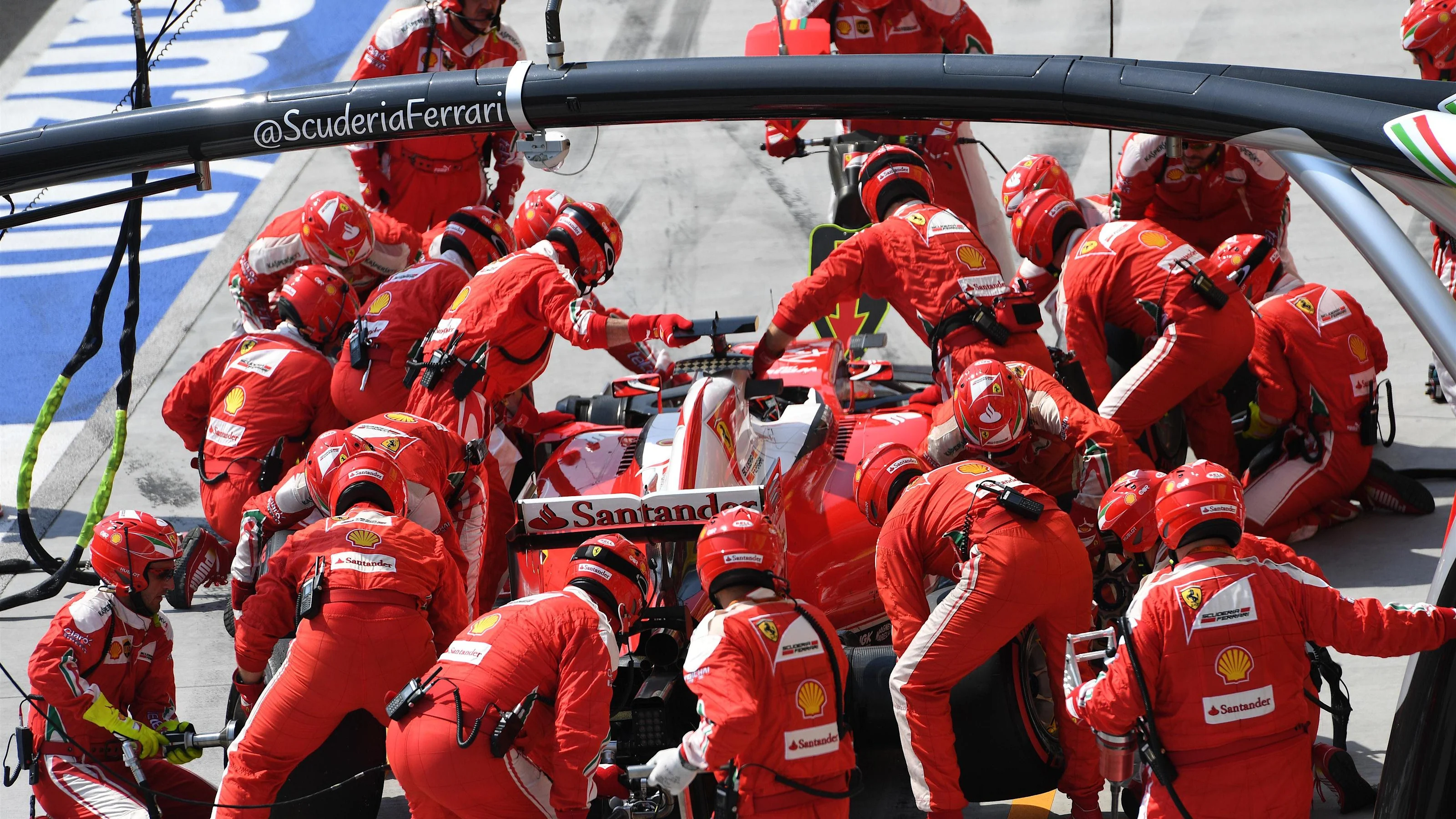 Kimi Raikkonen (FIN) Ferrari SF16-H pit stop at Formula One World Championship, Rd11, Hungarian