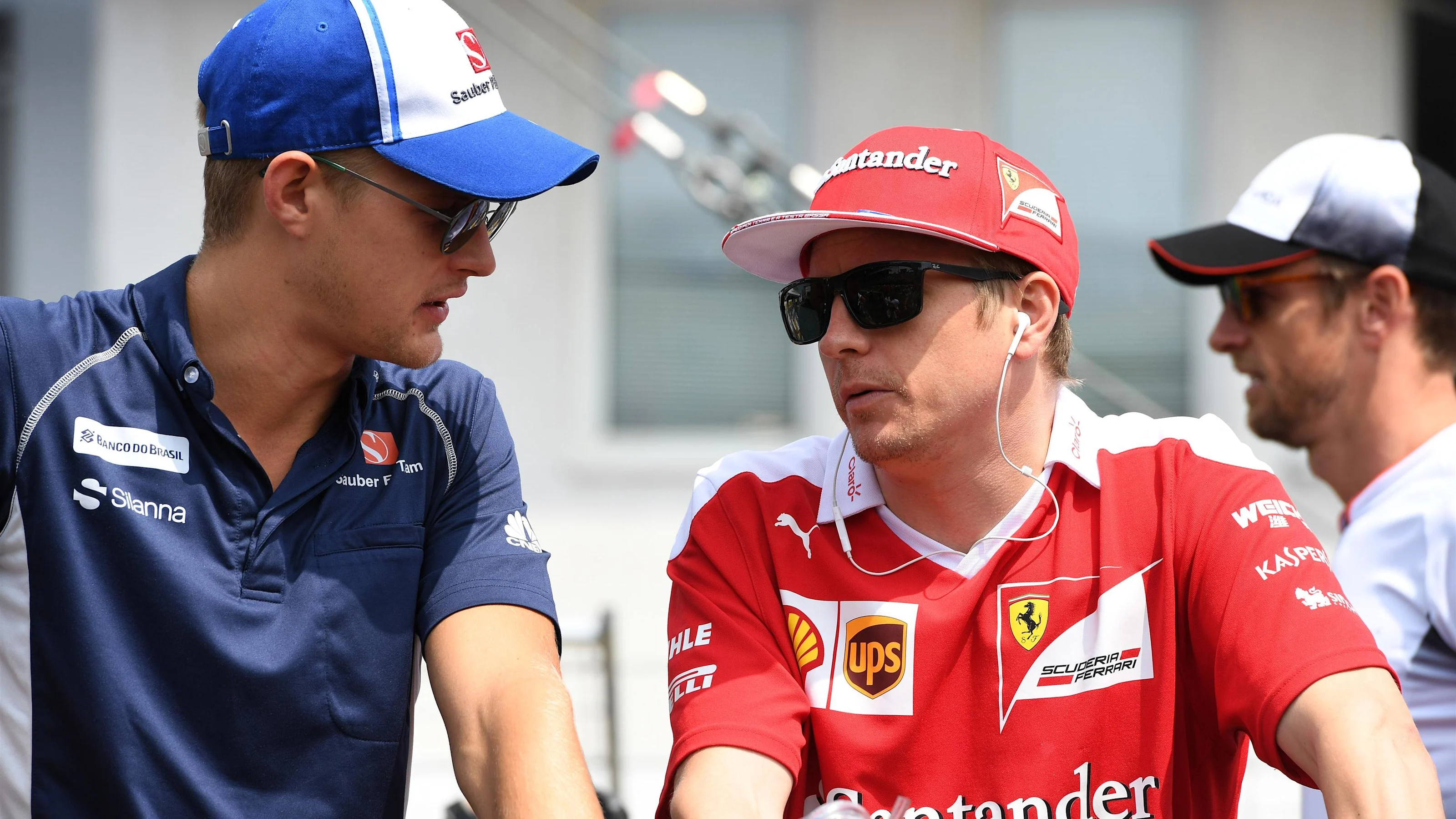 Marcus Ericsson (SWE) Sauber and Kimi Raikkonen (FIN) Ferrari on the drivers parade at Formula One