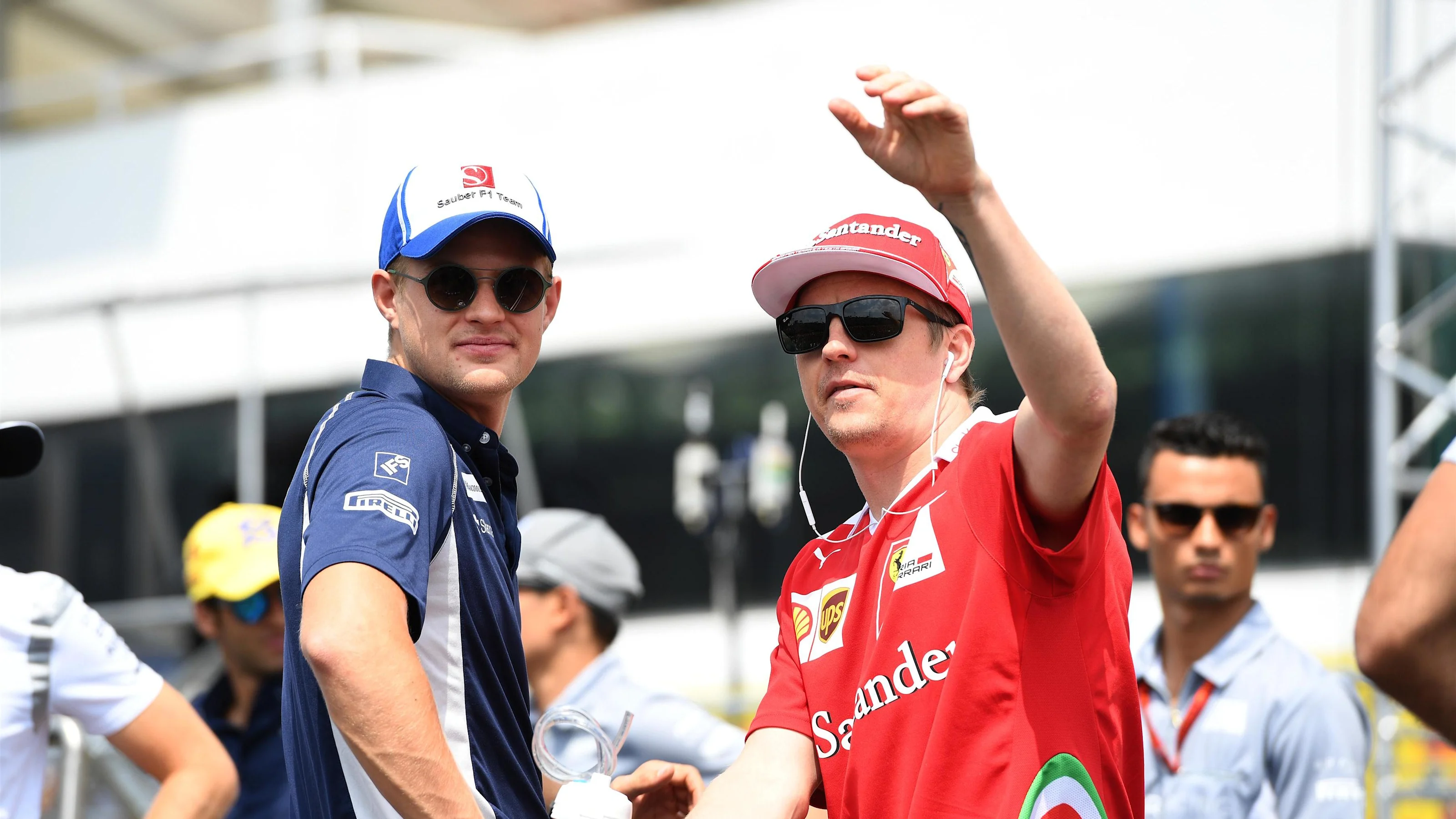 Marcus Ericsson (SWE) Sauber and Kimi Raikkonen (FIN) Ferrari on the drivers parade at Formula One
