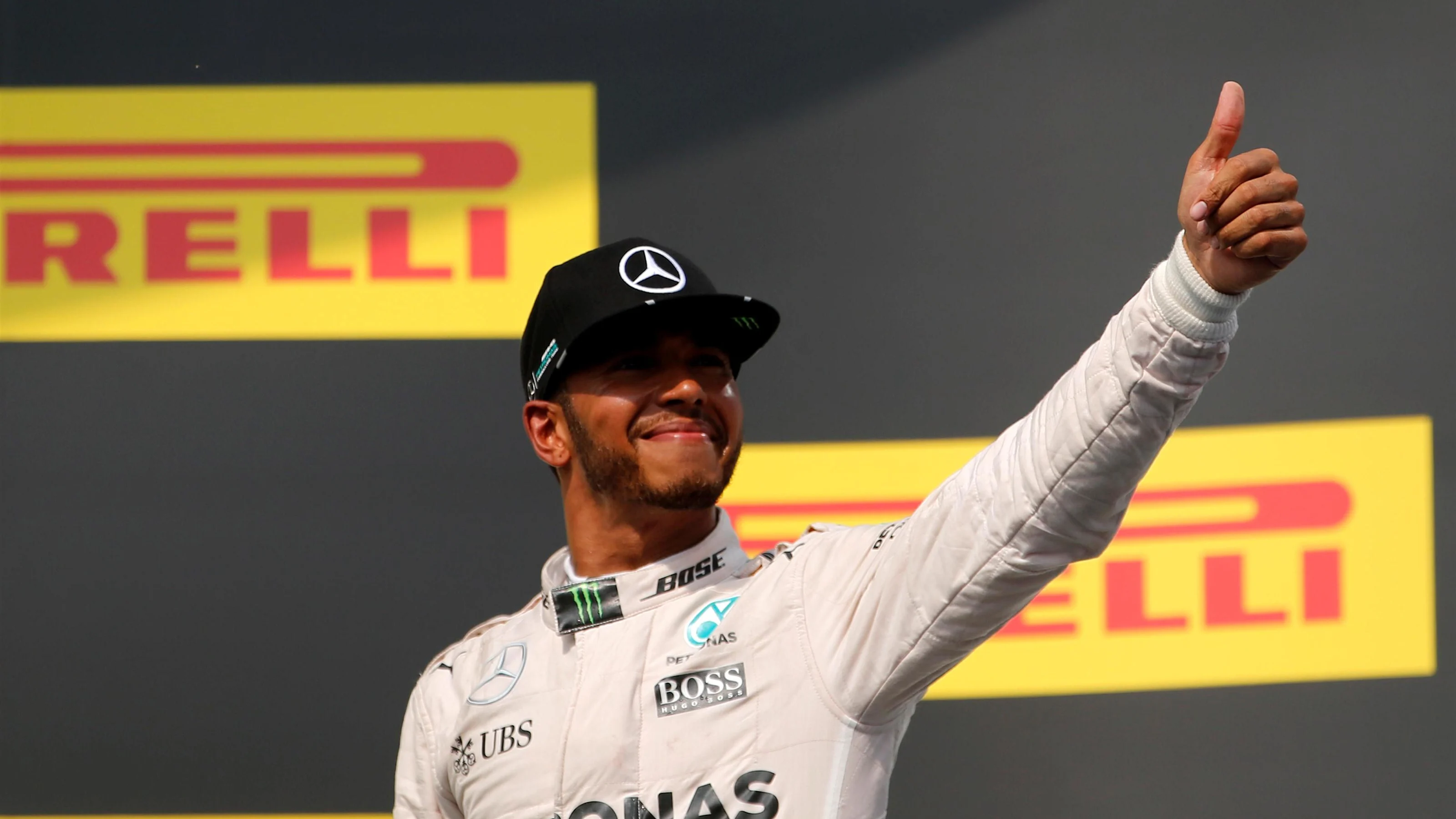 Race winner Lewis Hamilton (GBR) Mercedes AMG F1 celebrates on the podium at Formula One World