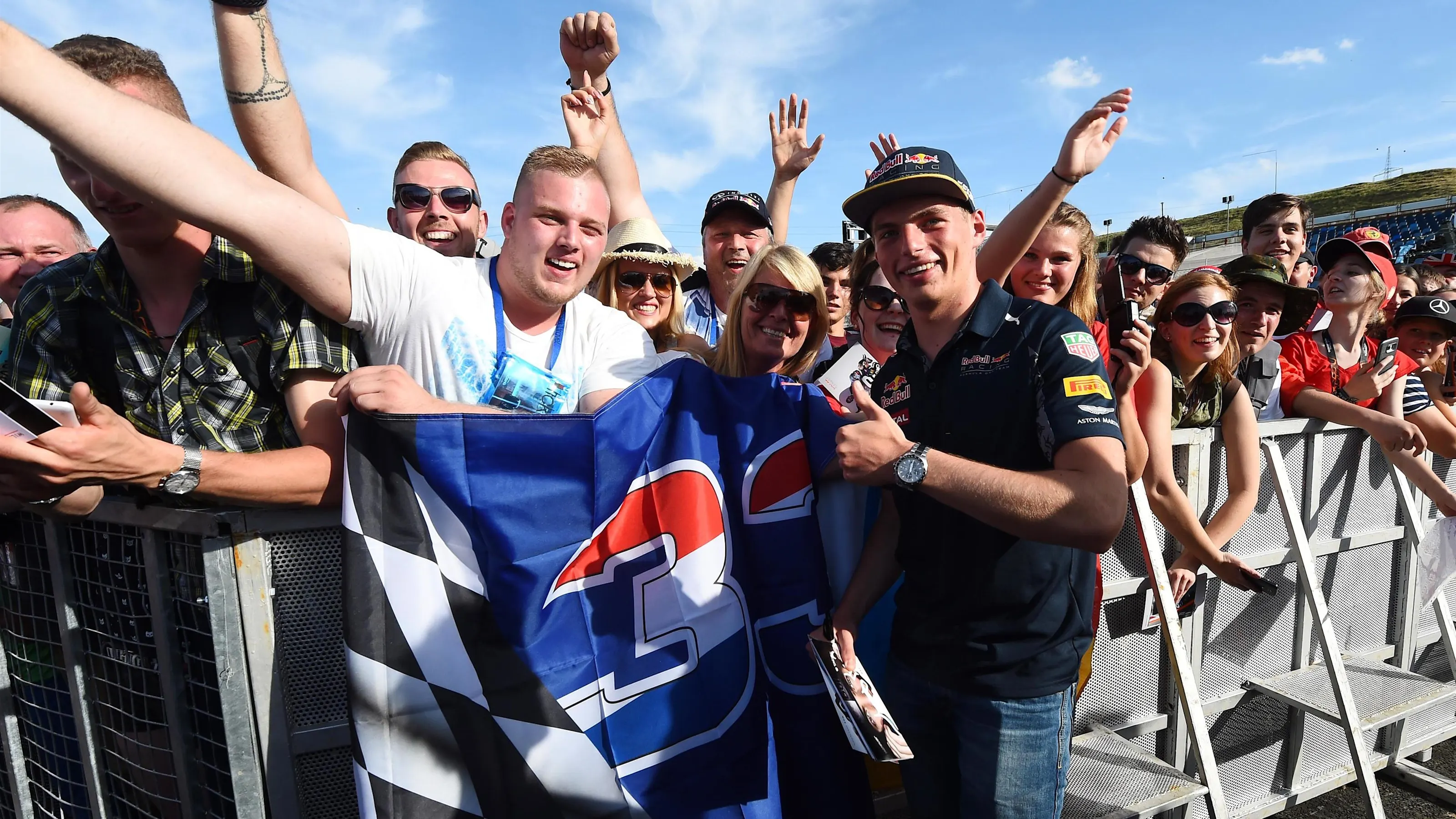 Max Verstappen (NED) Red Bull Racing with fans and banner at Formula One World Championship, Rd11,