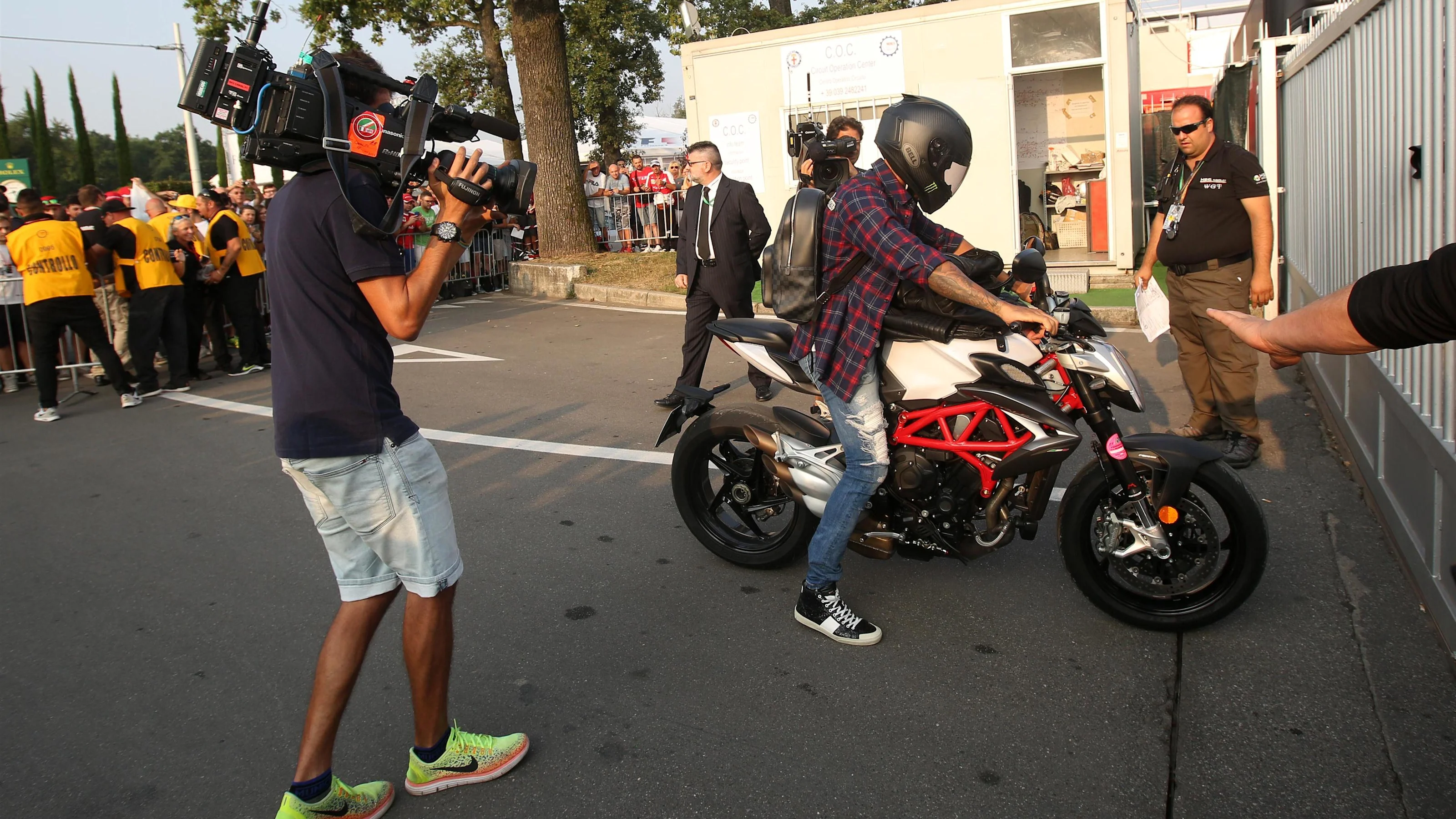 Lewis Hamilton (GBR) Mercedes AMG F1 on his MV Agusta Brutale motorbike at Formula One World