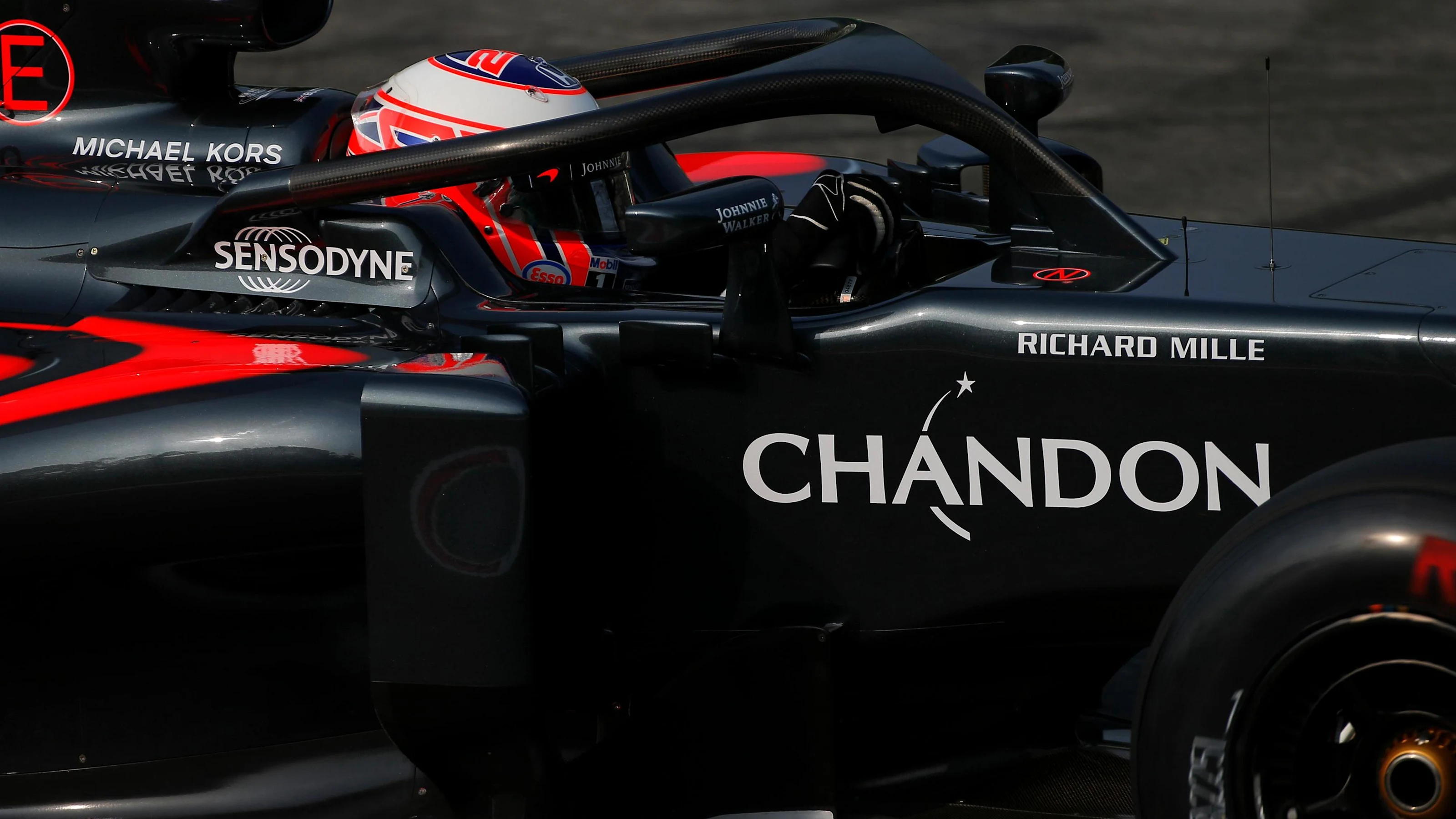 Jenson Button (GBR) McLaren MP4-31 with halo at Formula One World Championship, Rd14, Italian Grand