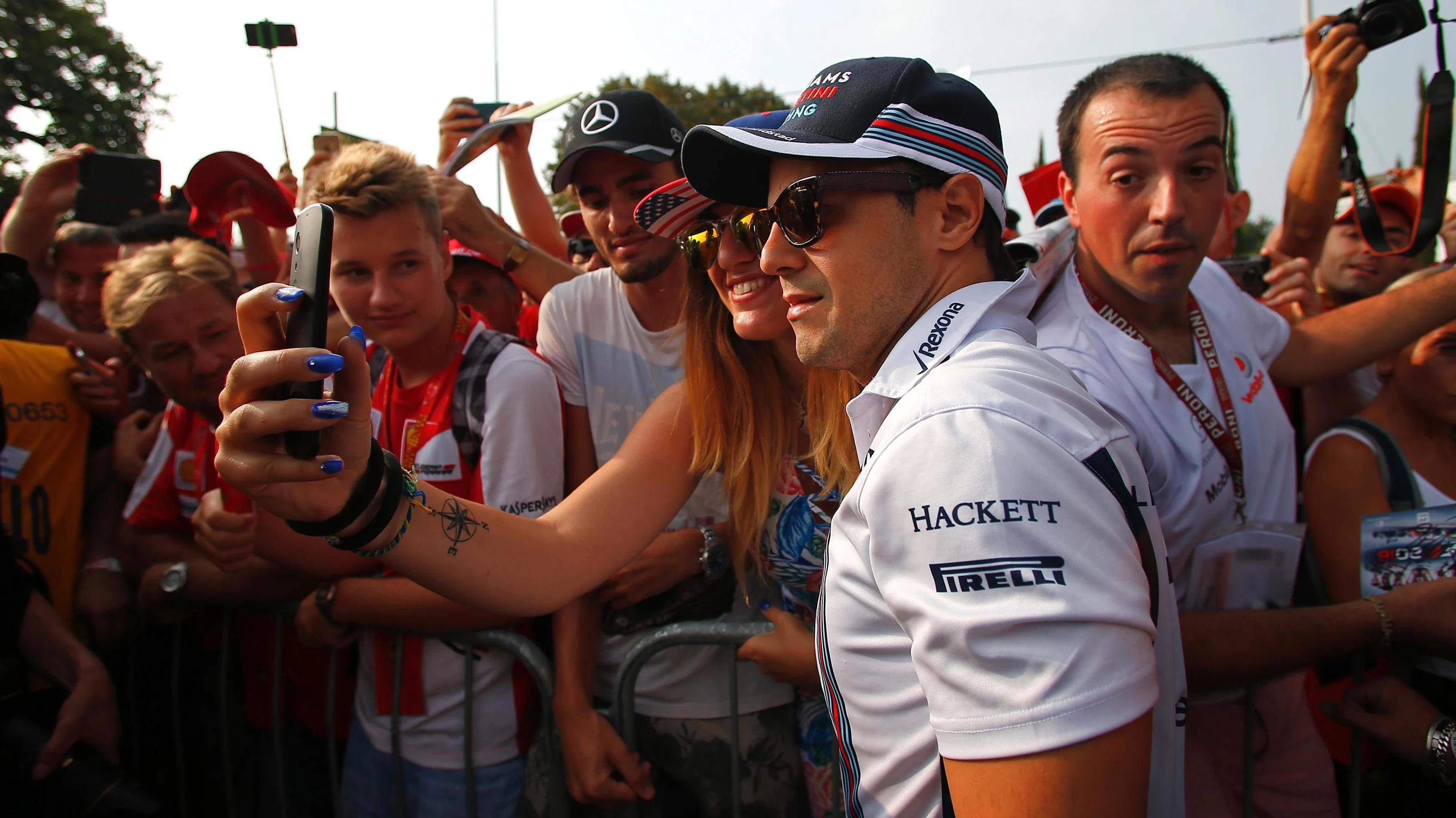 Felipe Massa (BRA) Williams poses for a selfie photograph with the fans at Formula One World