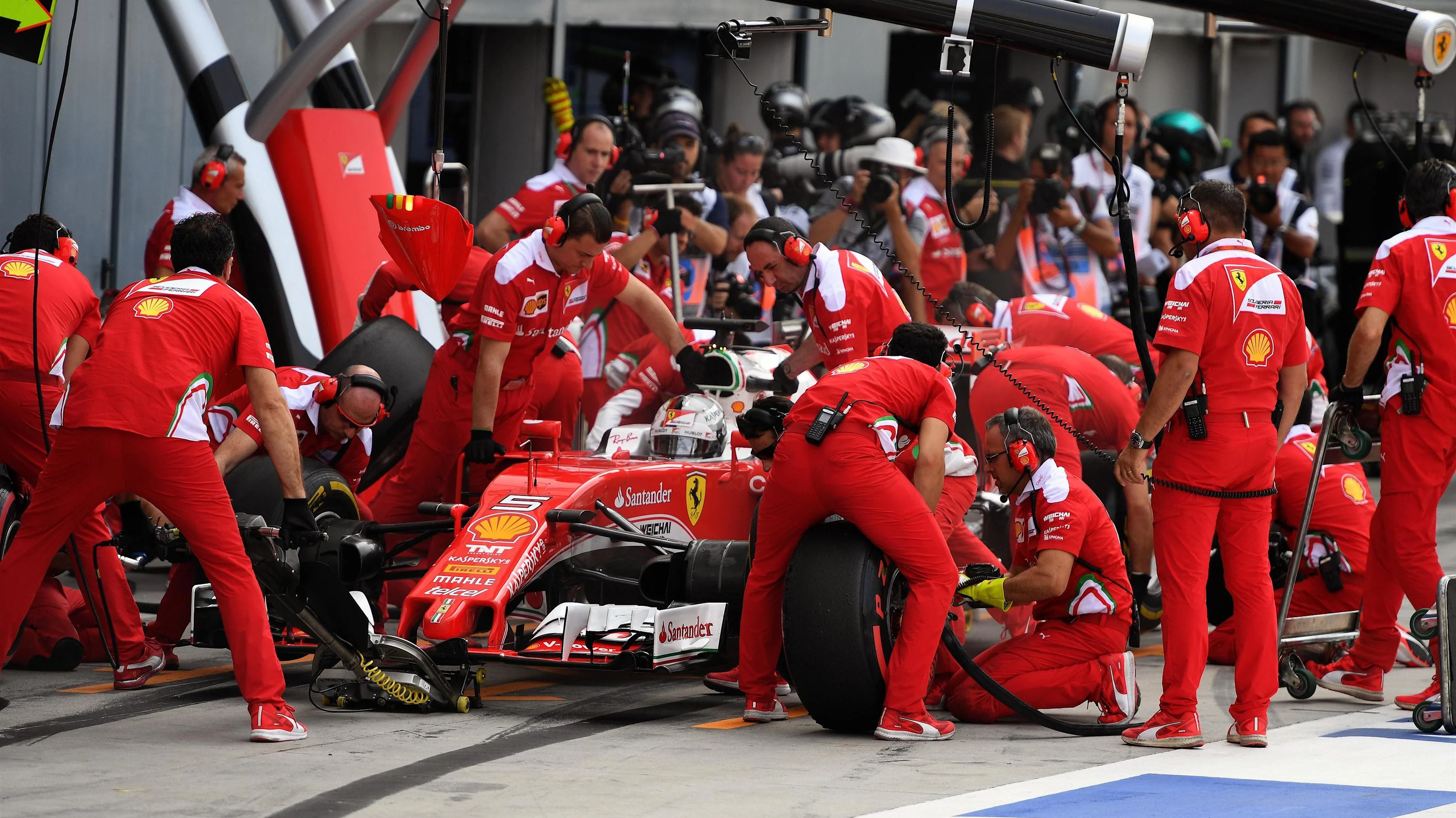 Sebastian Vettel (GER) Ferrari SF16-H pit stop at Formula One World Championship, Rd14, Italian