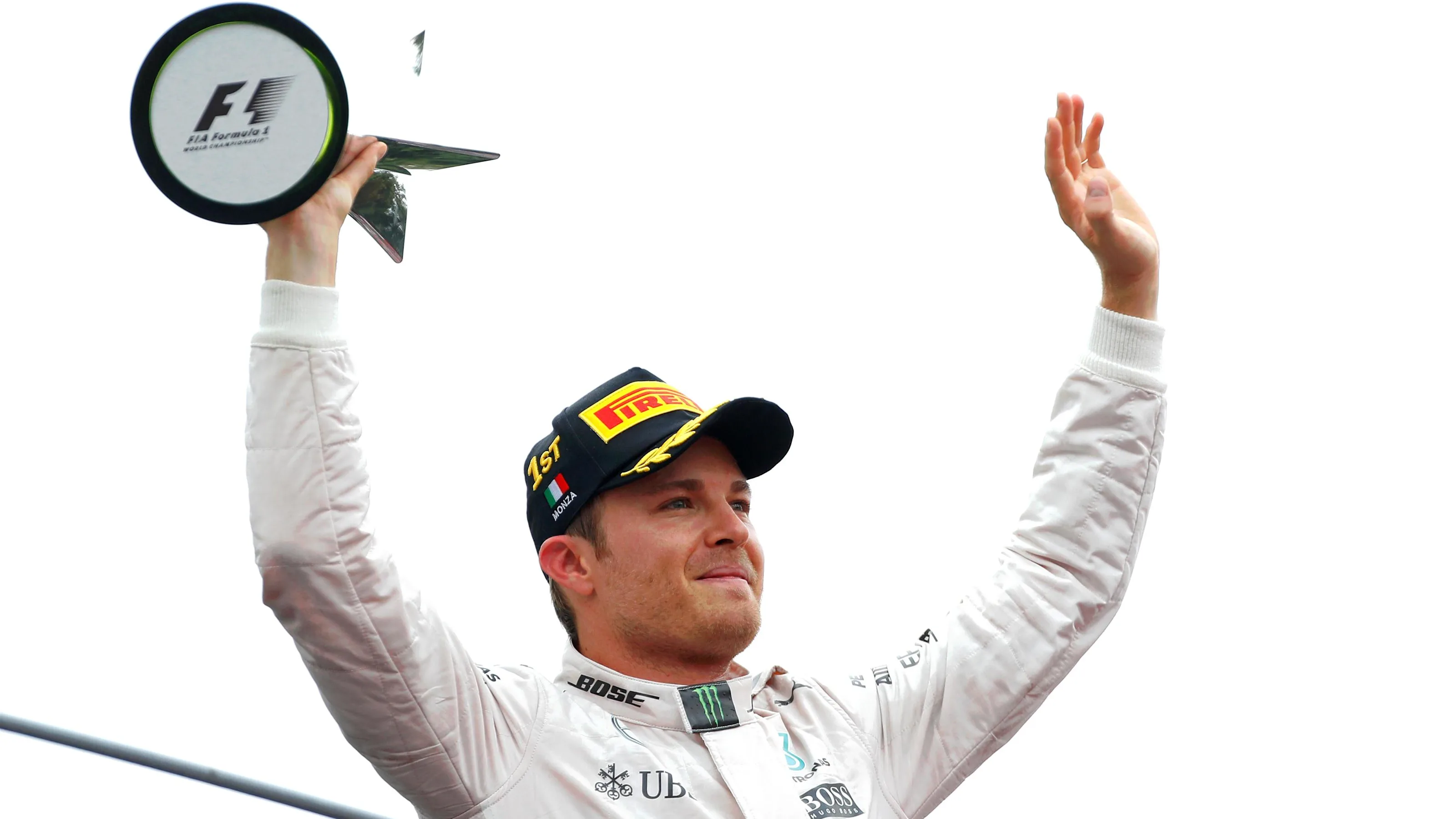 Race winner Nico Rosberg (GER) Mercedes AMG F1 celebrates on the podium with the trophy at Formula