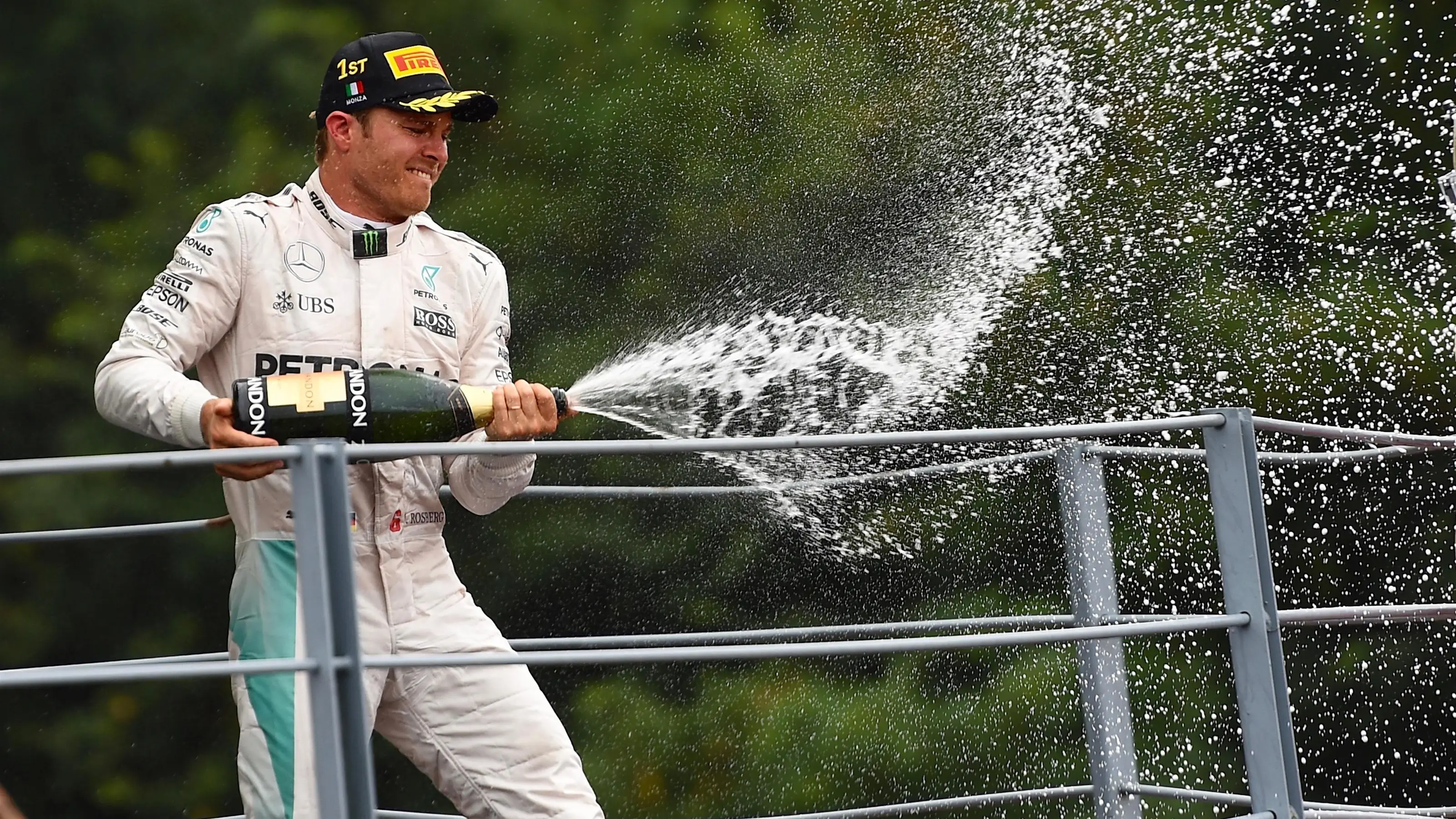 Race winner Nico Rosberg (GER) Mercedes AMG F1 celebrates on the podium with the champagne at