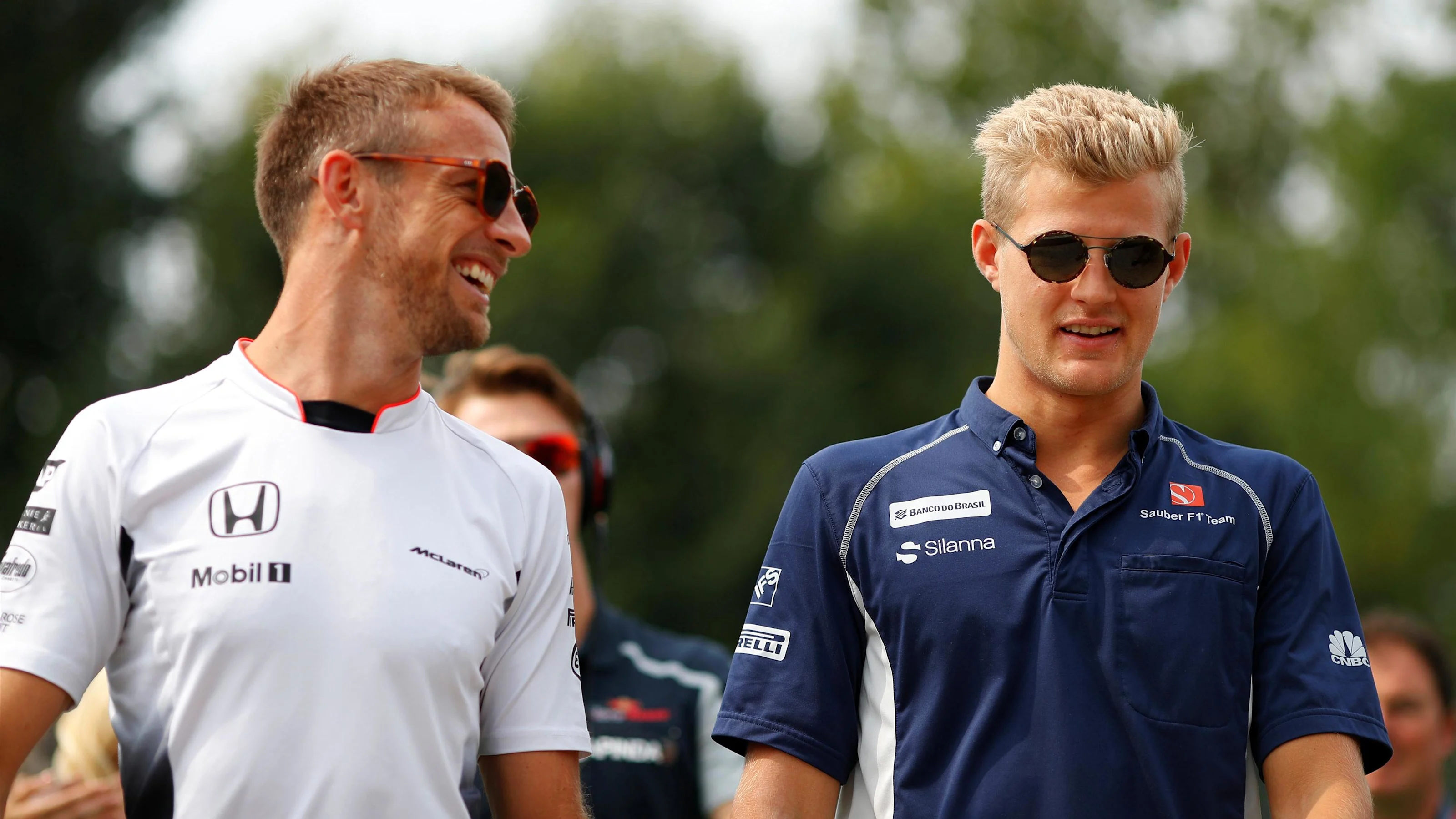 Jenson Button (GBR) McLaren and Marcus Ericsson (SWE) Sauber on the drivers parade at Formula One