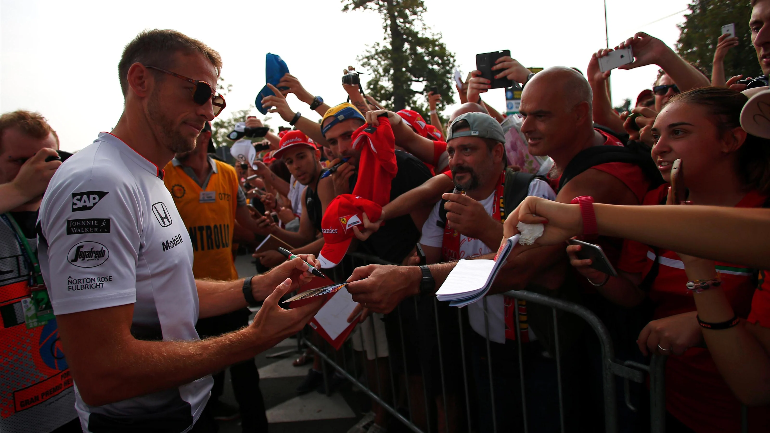 Jenson Button (GBR) McLaren signs autographs for the fans at Formula One World Championship, Rd14,