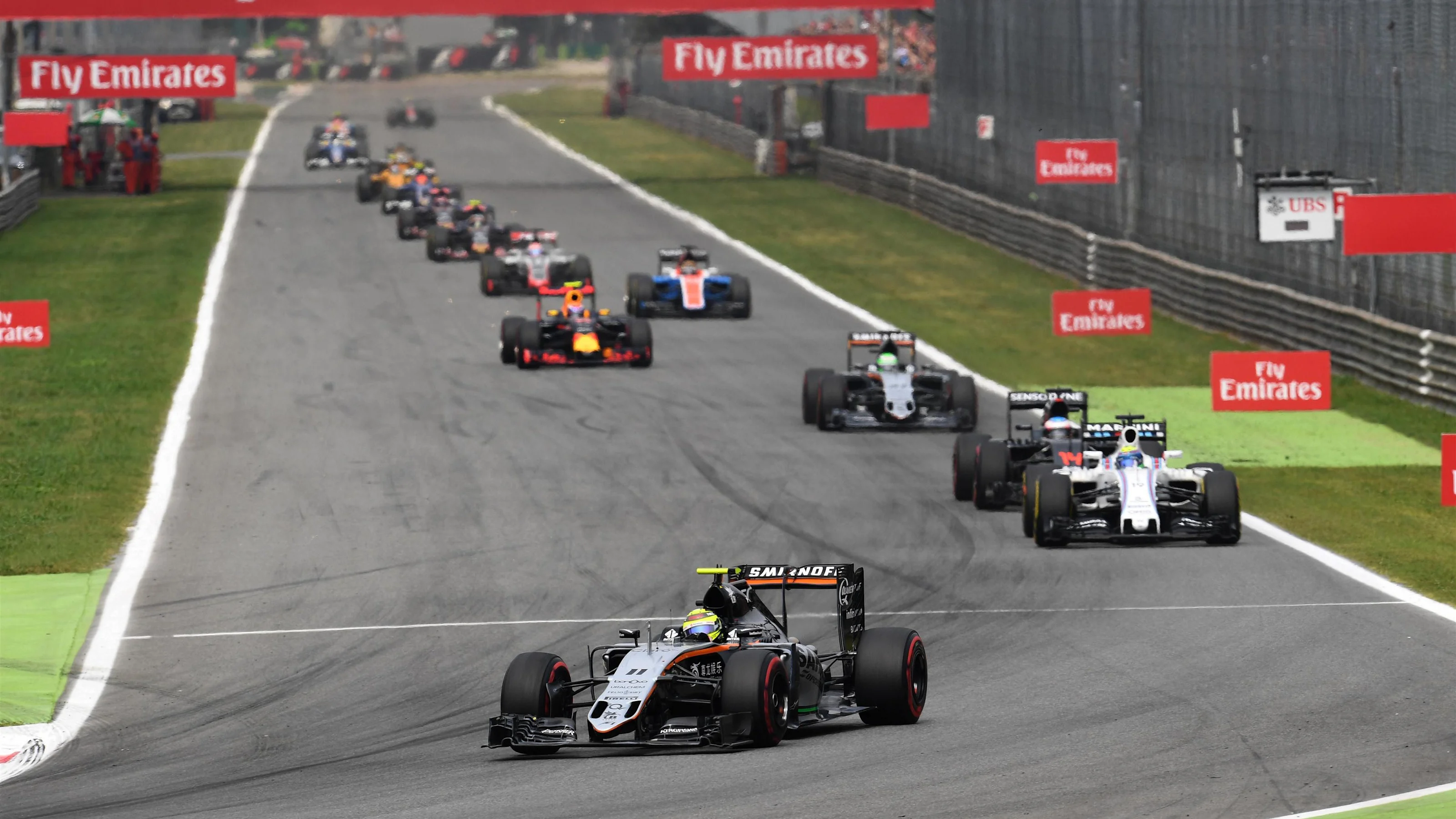 Sergio Perez (MEX) Force India VJM09 on lap one at Formula One World Championship, Rd14, Italian