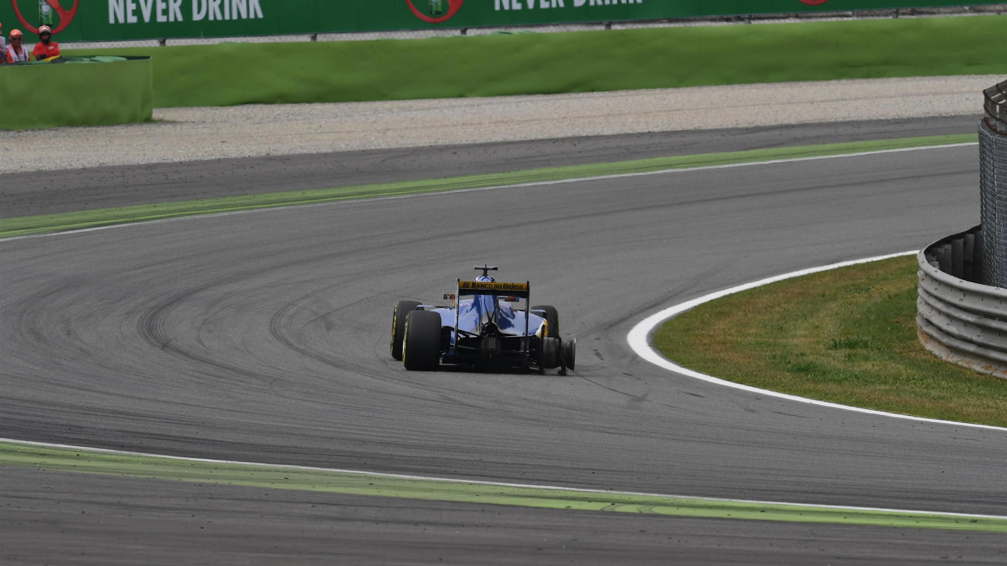 Felipe Nasr (BRA) Sauber C35 with puncture on lap one at Formula One World Championship, Rd14,