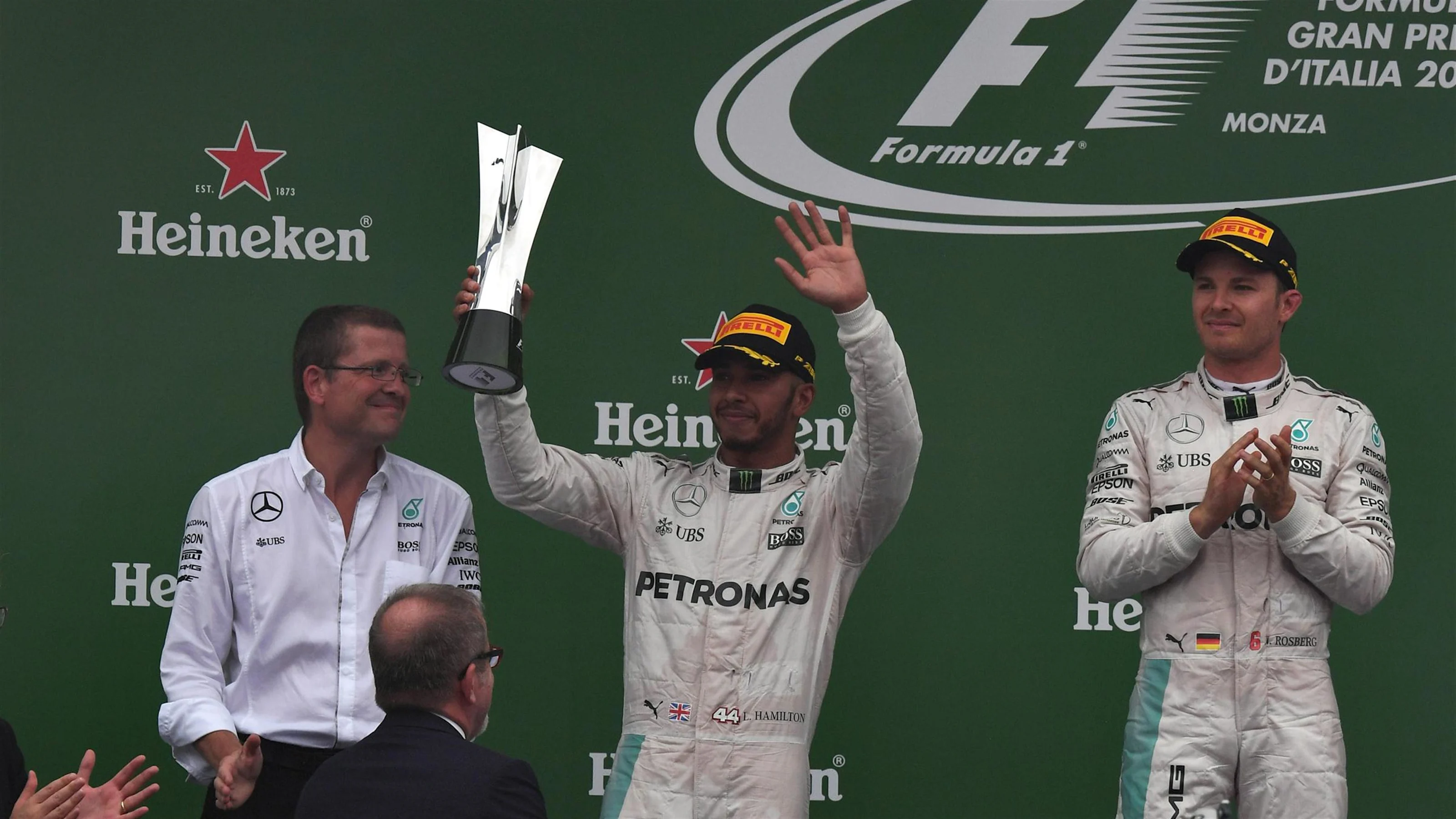 Lewis Hamilton (GBR) Mercedes AMG F1 celebrates on the podium with the trophy at Formula One World