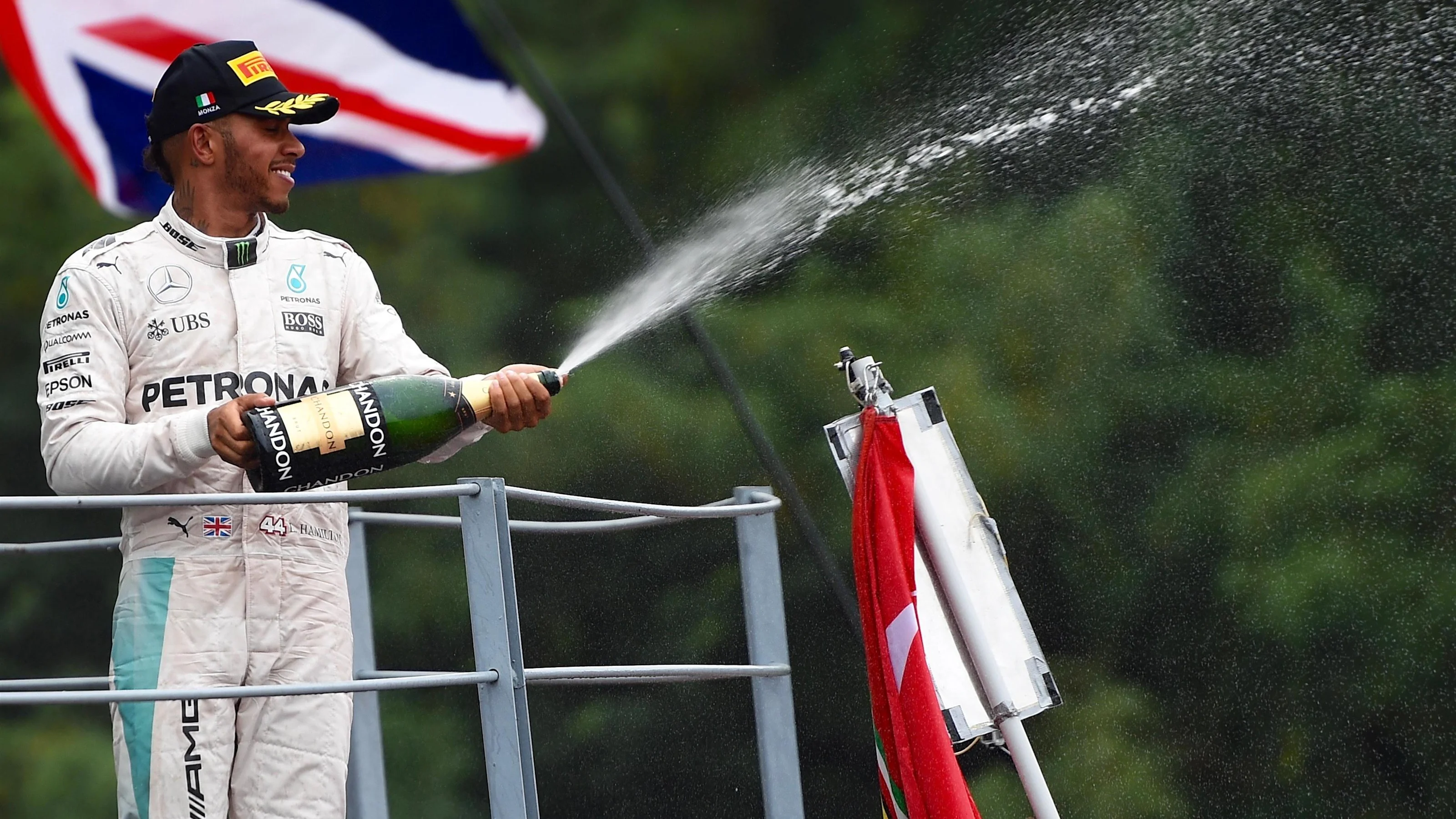 Lewis Hamilton (GBR) Mercedes AMG F1 celebrates on the podium with the champagne at Formula One