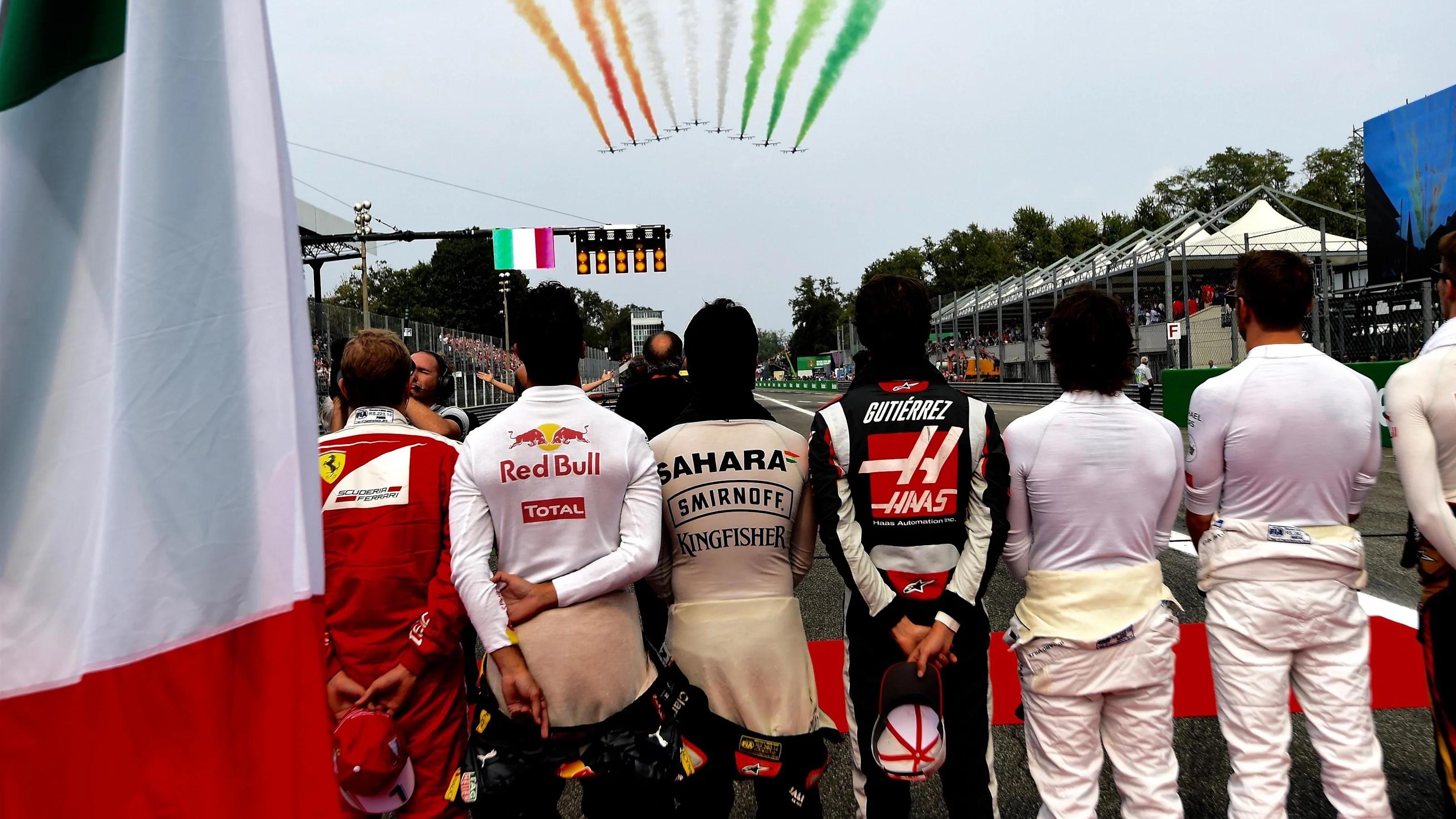 Driver observe the National Anthem on the grid and fly past at Formula One World Championship,