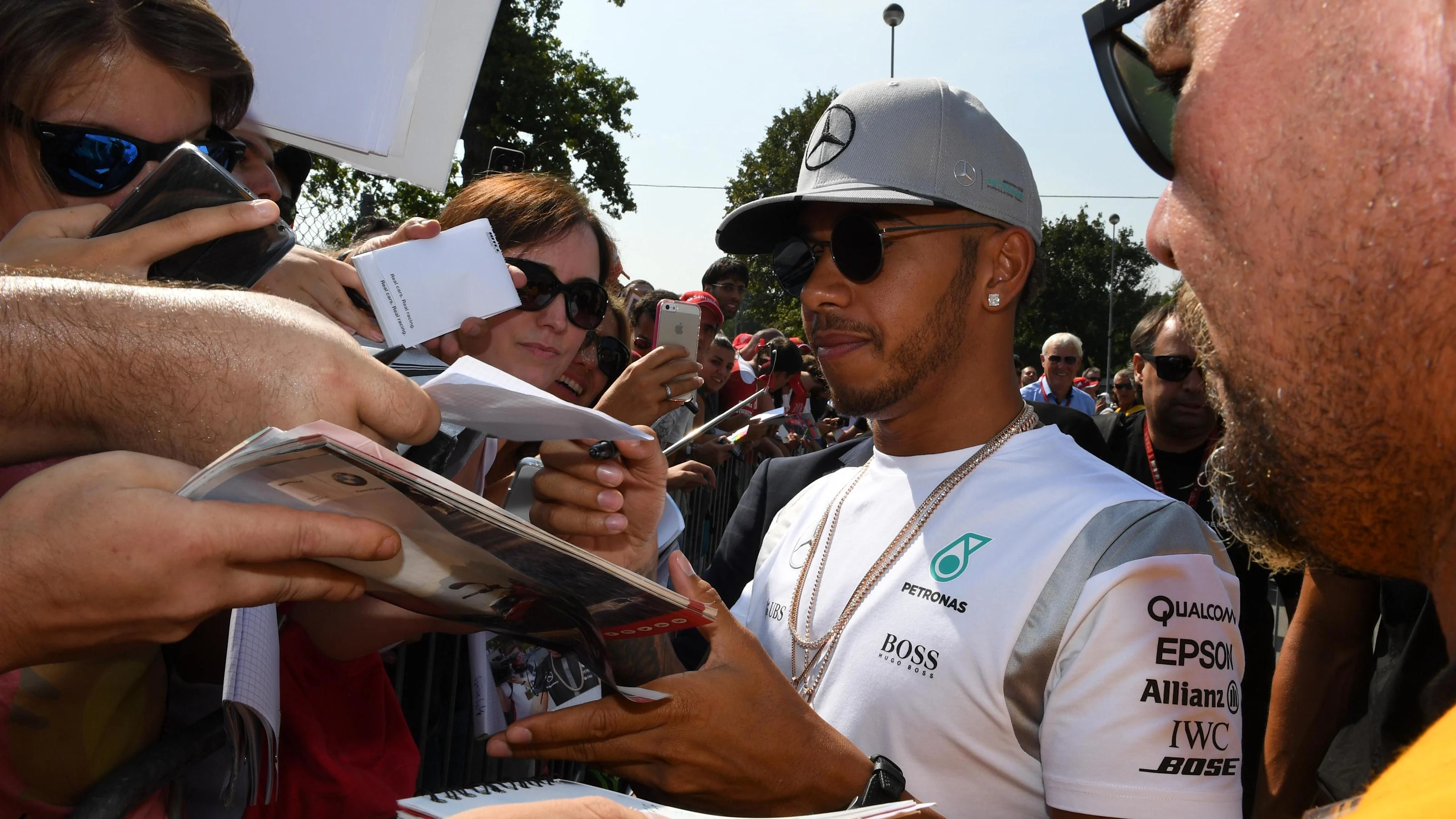 Lewis Hamilton (GBR) Mercedes AMG F1 signs autographs for the fans at Formula One World