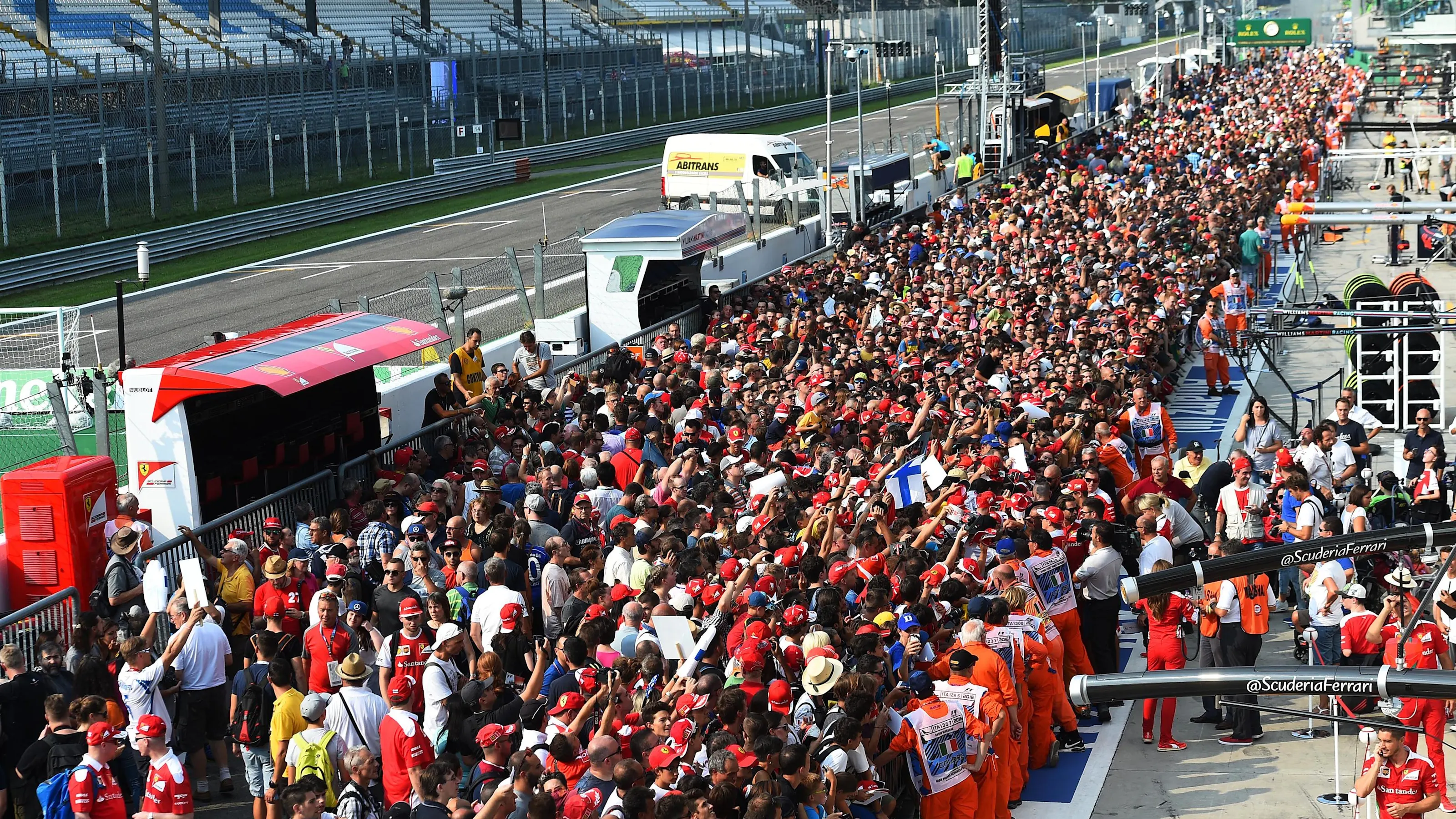 Sebastian Vettel (GER) Ferrari and Kimi Raikkonen (FIN) Ferrari sign autographs for the fans at