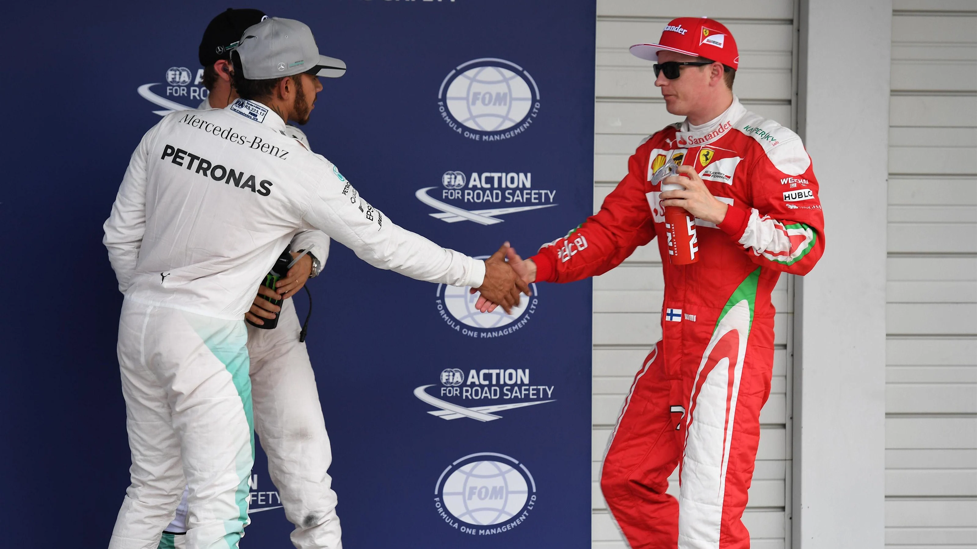 Lewis Hamilton (GBR) Mercedes AMG F1 and Kimi Raikkonen (FIN) Ferrari celebrate in parc ferme at