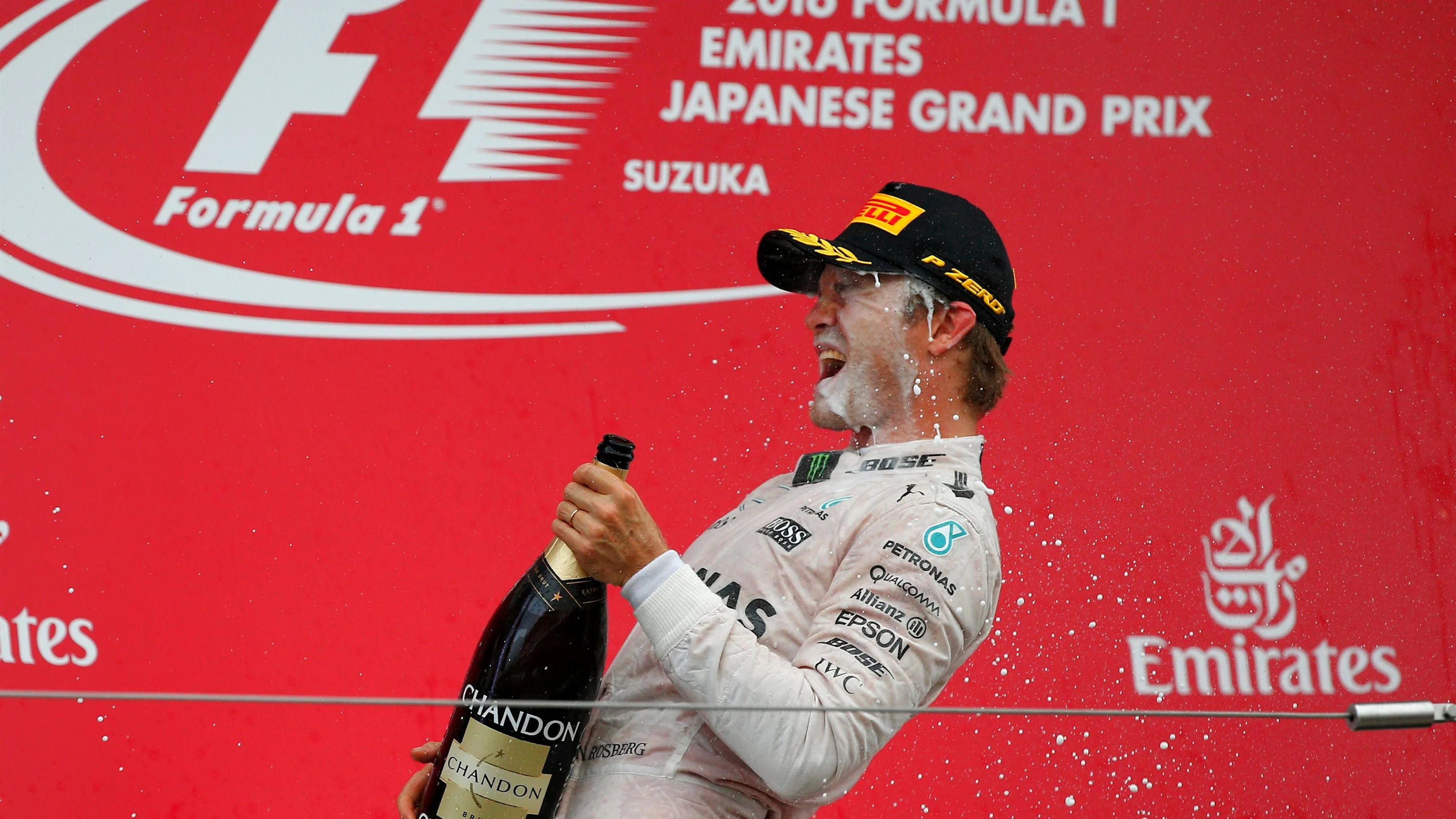Race winner Nico Rosberg (GER) Mercedes AMG F1 celebrates on the podium with the champagne at