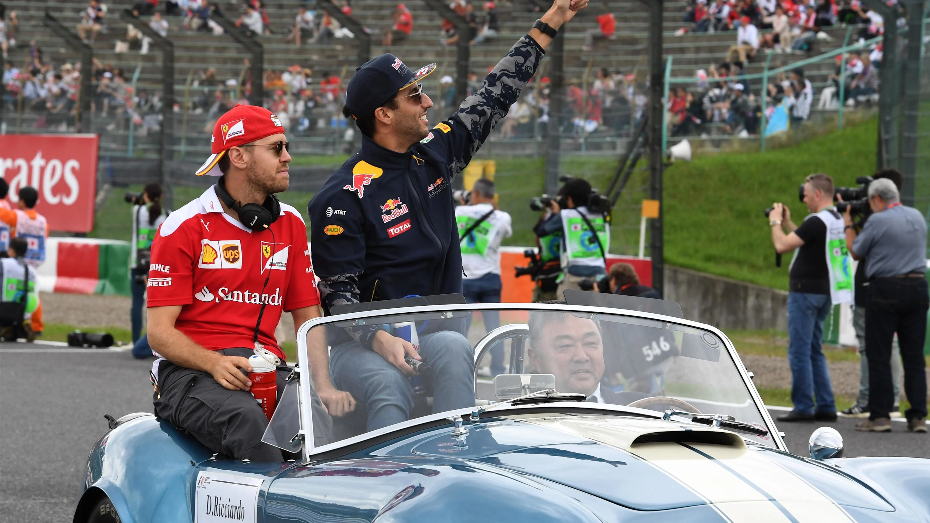 Sebastian Vettel (GER) Ferrari and Daniel Ricciardo (AUS) Red Bull Racing on the drivers parade at
