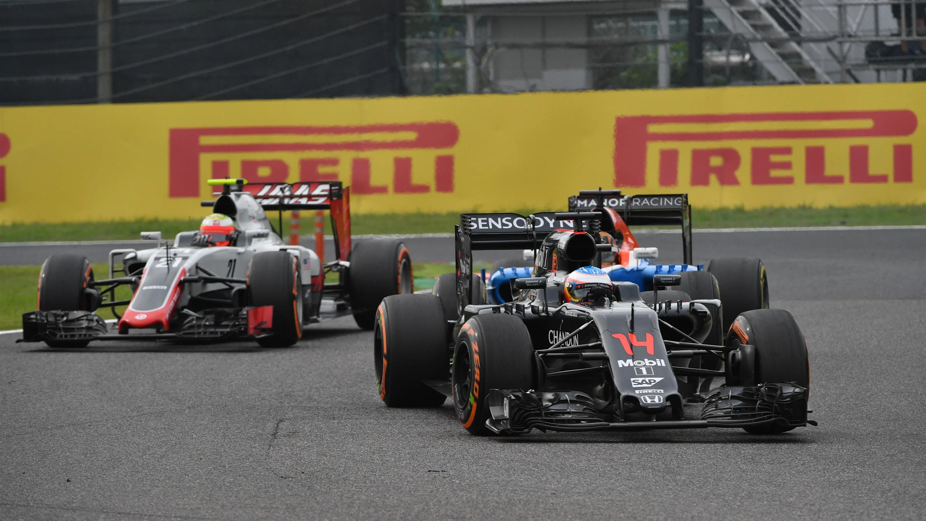Fernando Alonso (ESP) McLaren MP4-31 at Formula One World Championship, Rd17, Japanese Grand Prix,