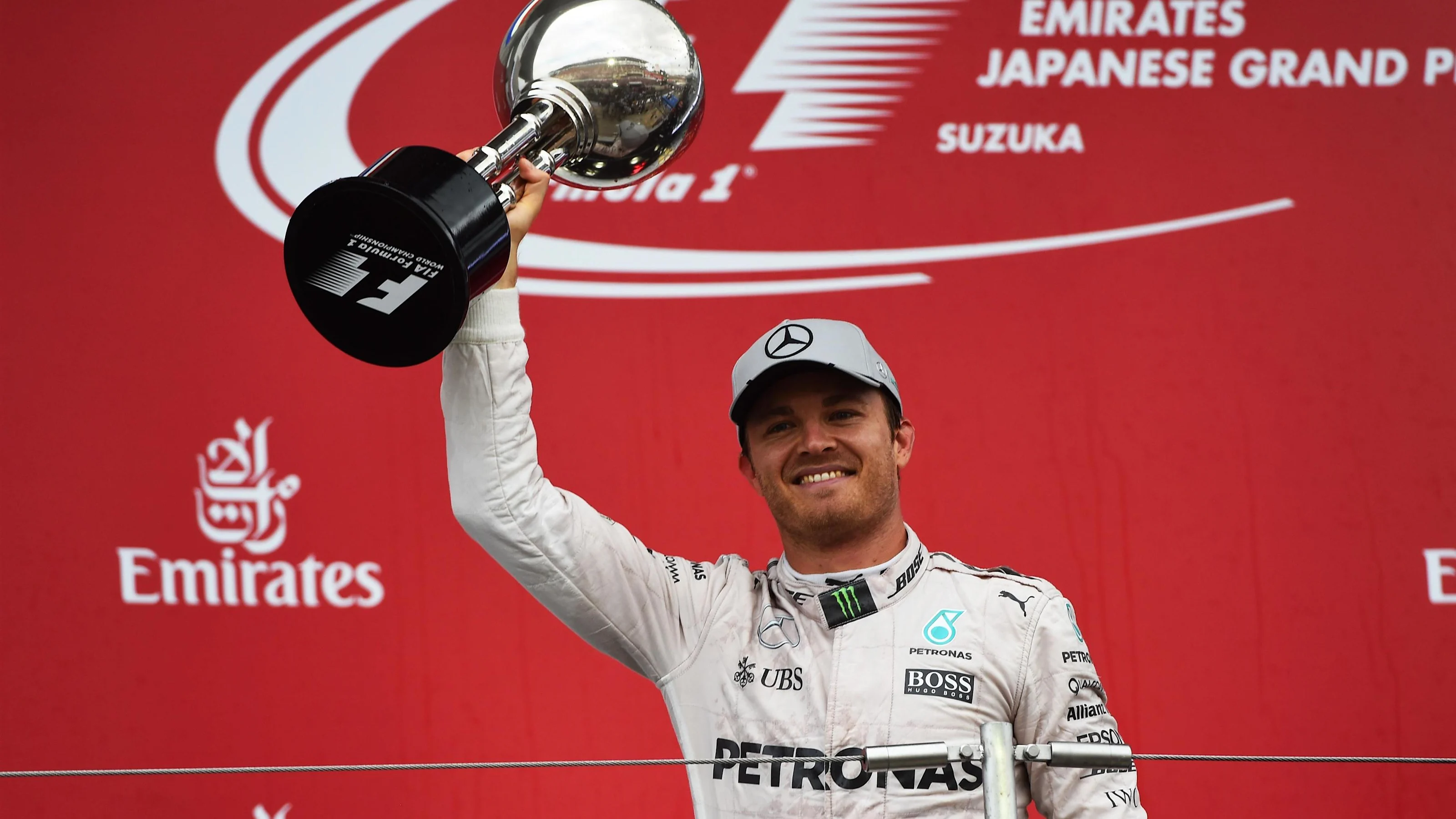 Race winner Nico Rosberg (GER) Mercedes AMG F1 celebrates on the podium with the trophy at Formula