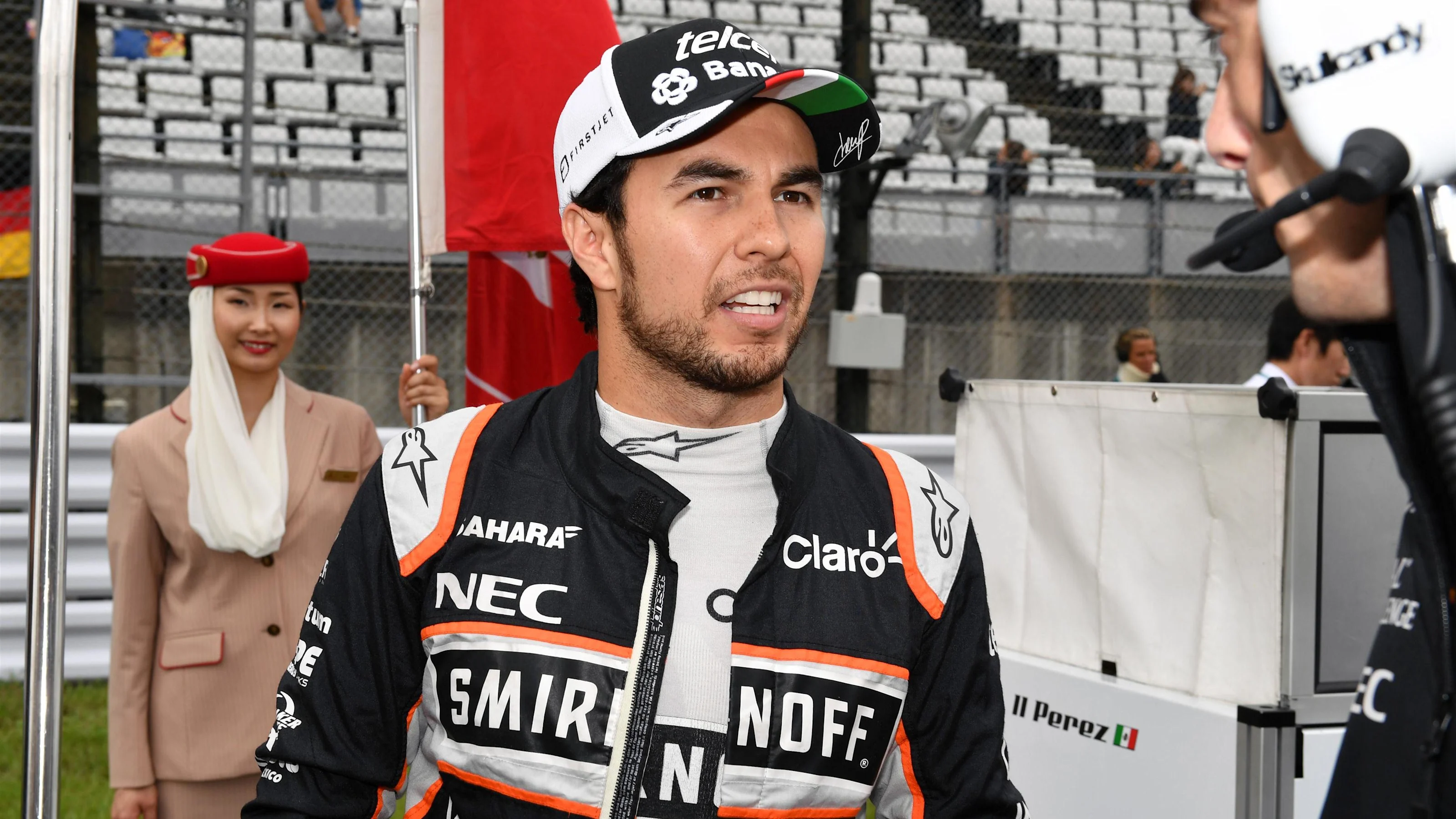 Sergio Perez (MEX) Force India on the grid at Formula One World Championship, Rd17, Japanese Grand