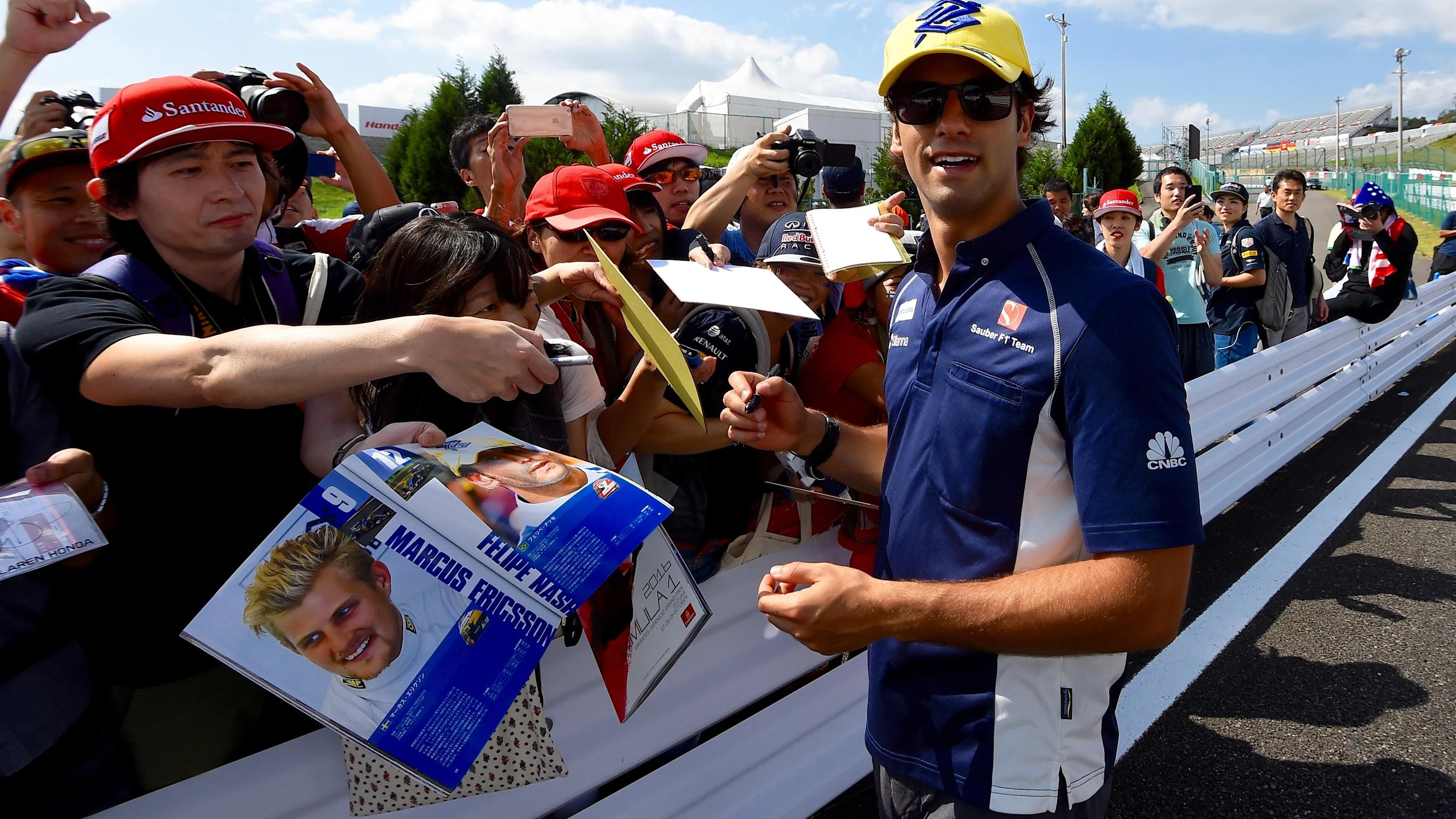 Felipe Nasr (BRA) Sauber signs autographs for the fans at Formula One World Championship, Rd17,