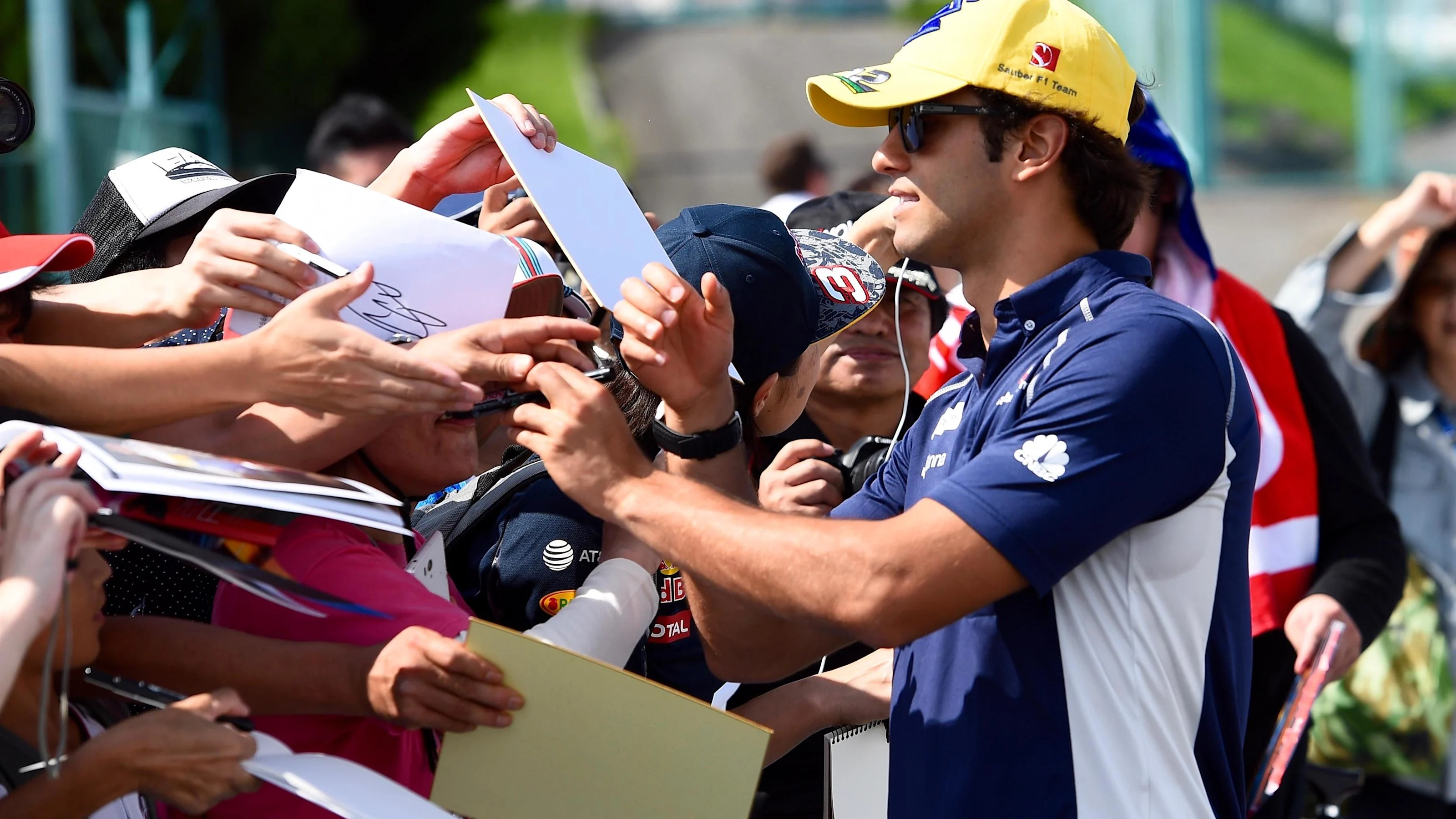 Felipe Nasr (BRA) Sauber signs autographs for the fans at Formula One World Championship, Rd17,