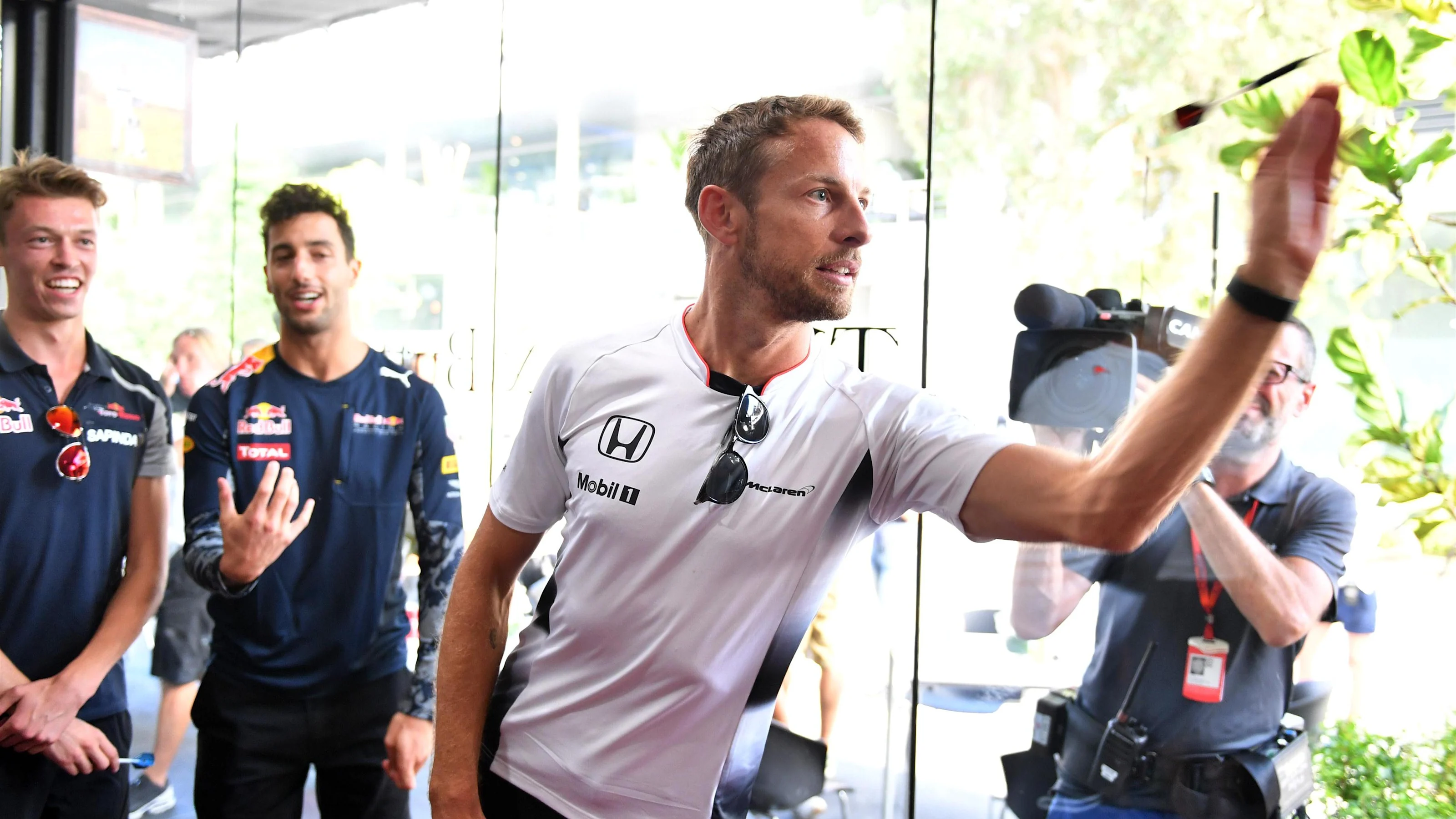 Jenson Button (GBR) McLaren plays darts aat the celebration of his 300th Grand Prix at Formula One