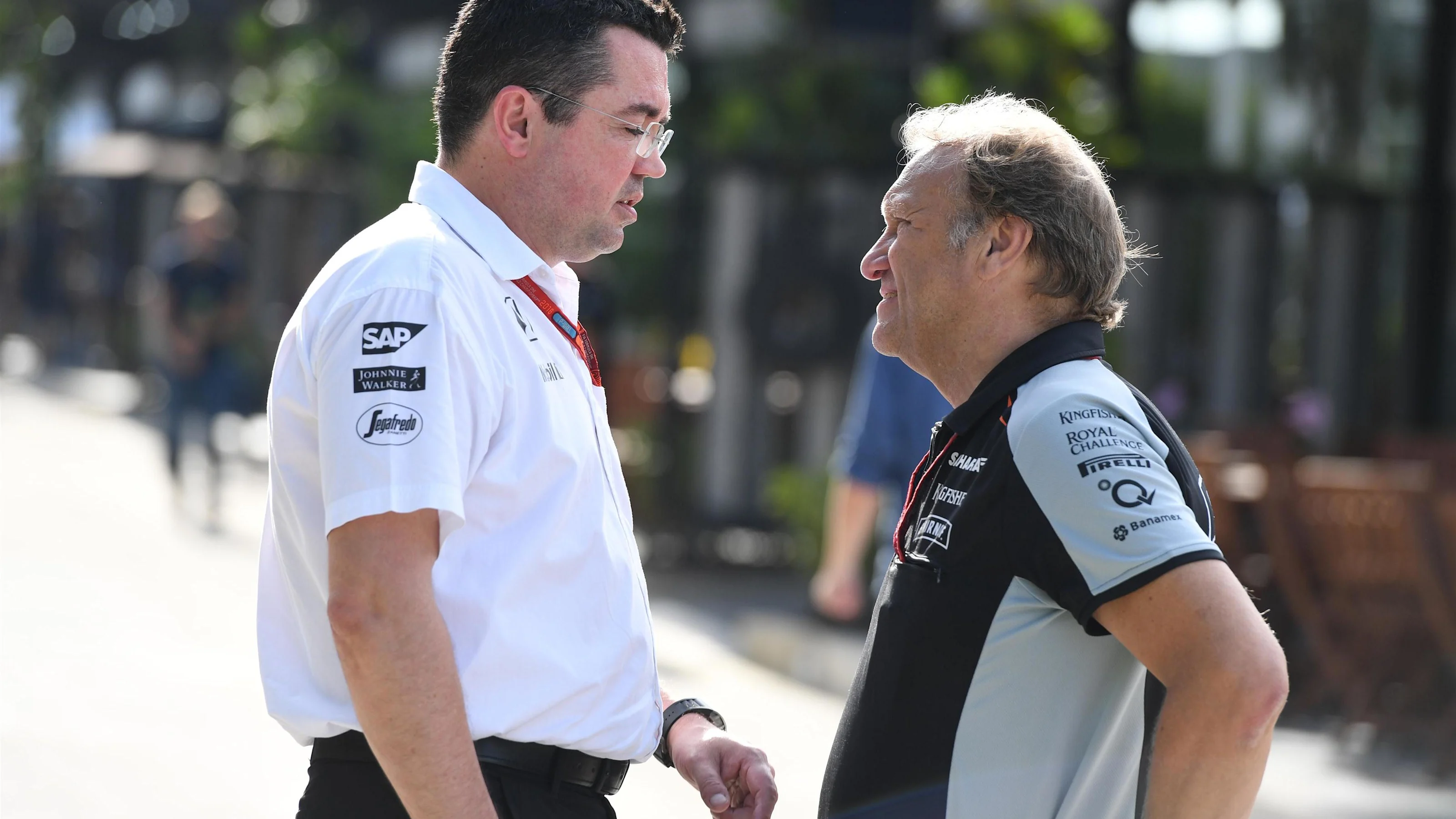 Eric Boullier (FRA) McLaren Racing Director and Robert Fearnley (GBR) Force India F1 Team Deputy