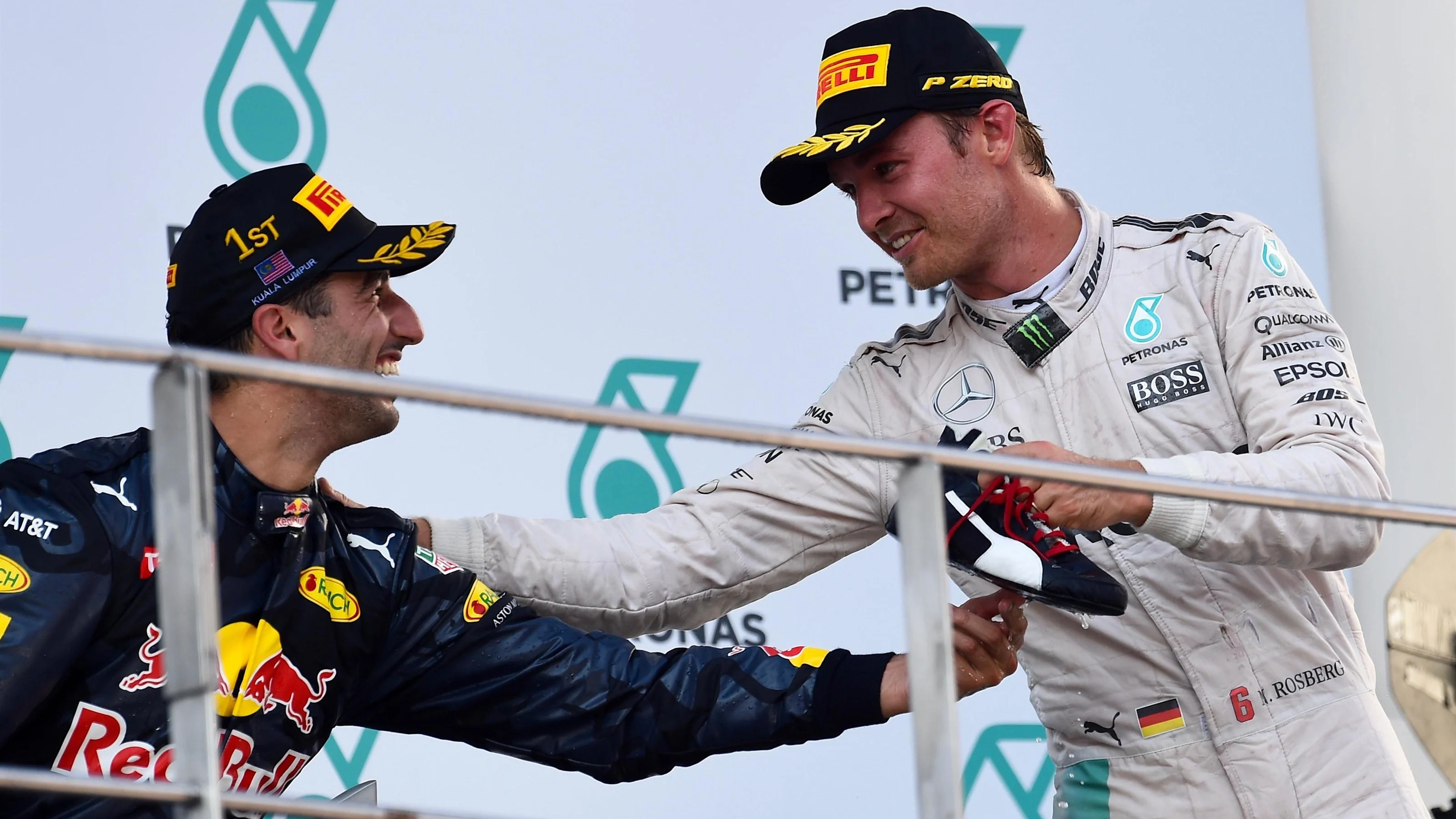 Race winner Daniel Ricciardo (AUS) Red Bull Racing and Nico Rosberg (GER) Mercedes AMG F1 celebrate