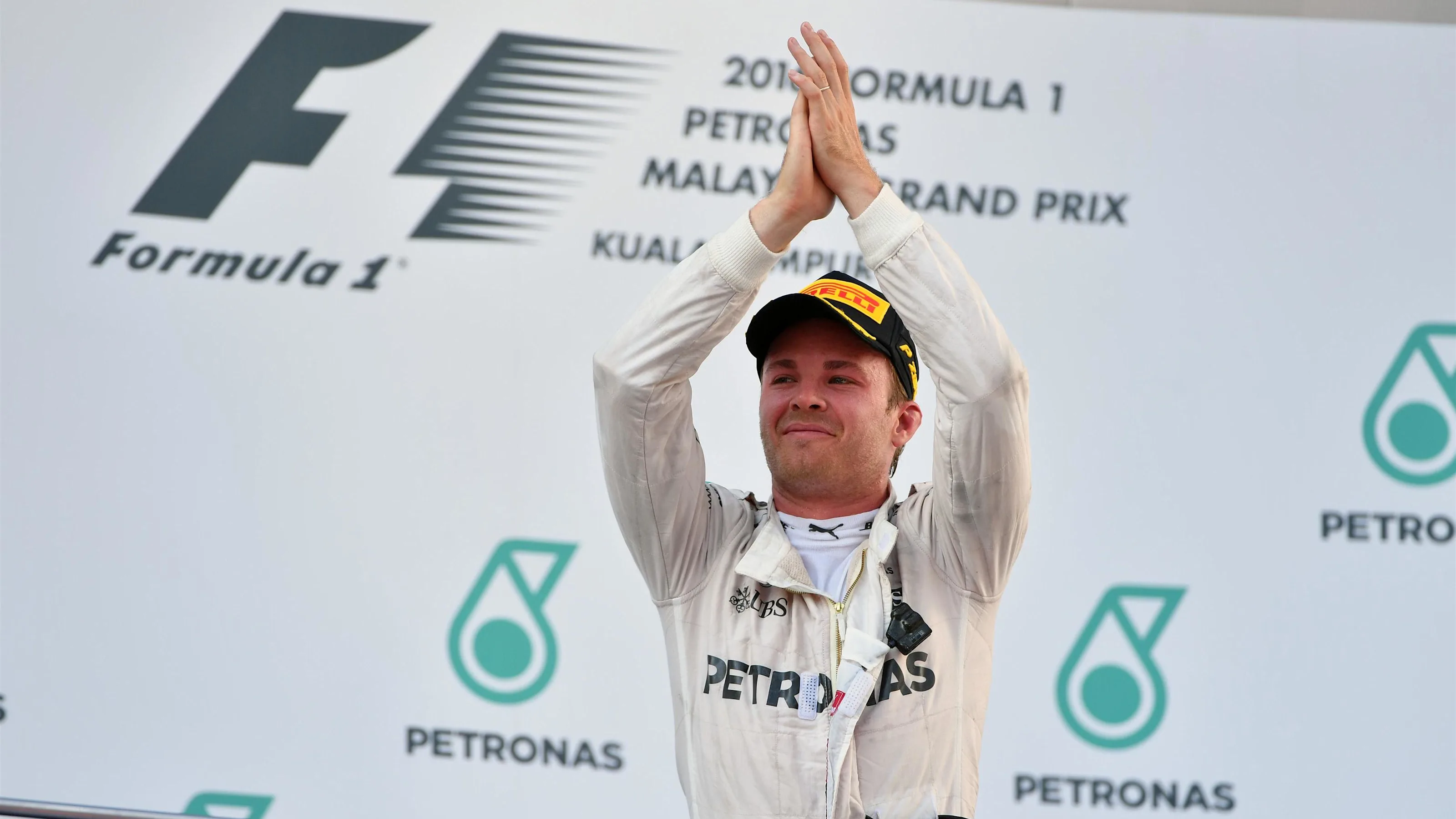 Nico Rosberg (GER) Mercedes AMG F1 celebrates on the podium at Formula One World Championship,