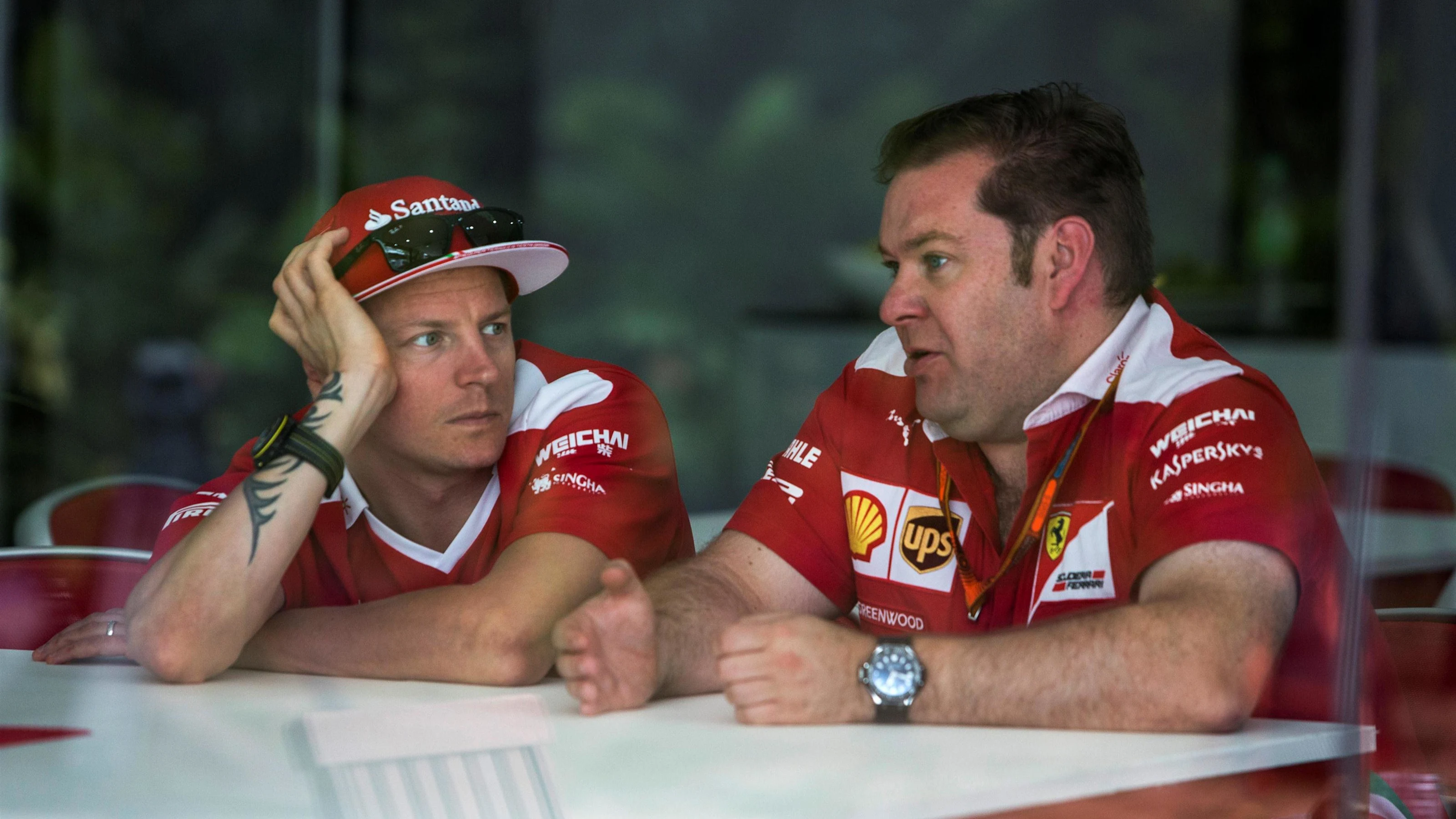 Kimi Raikkonen (FIN) Ferrari with Dave Greenwood (GBR) Ferrari Race Engineer at Formula One World
