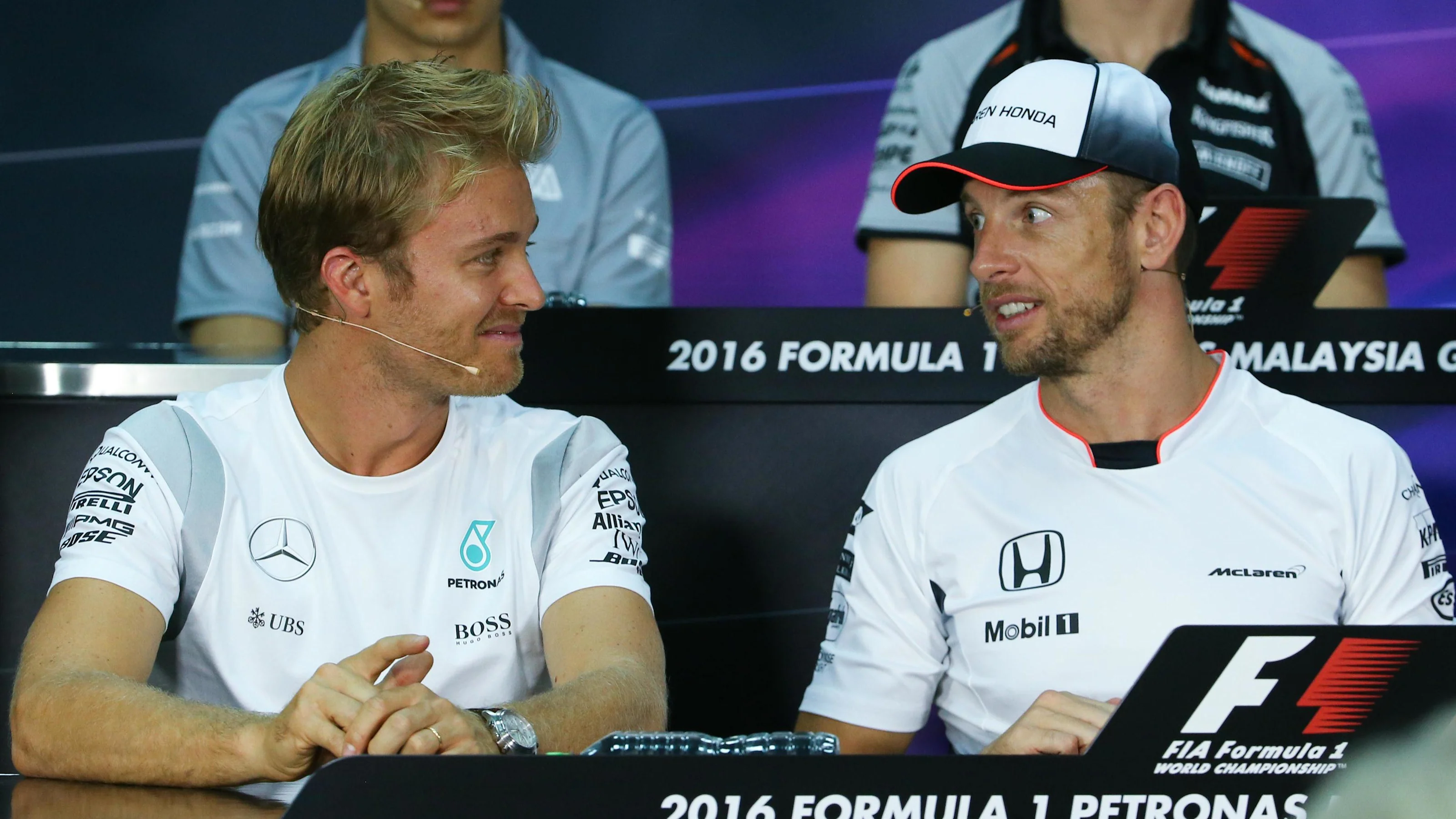 Nico Rosberg (GER) Mercedes AMG F1 and Jenson Button (GBR) McLaren in the Press Conference at