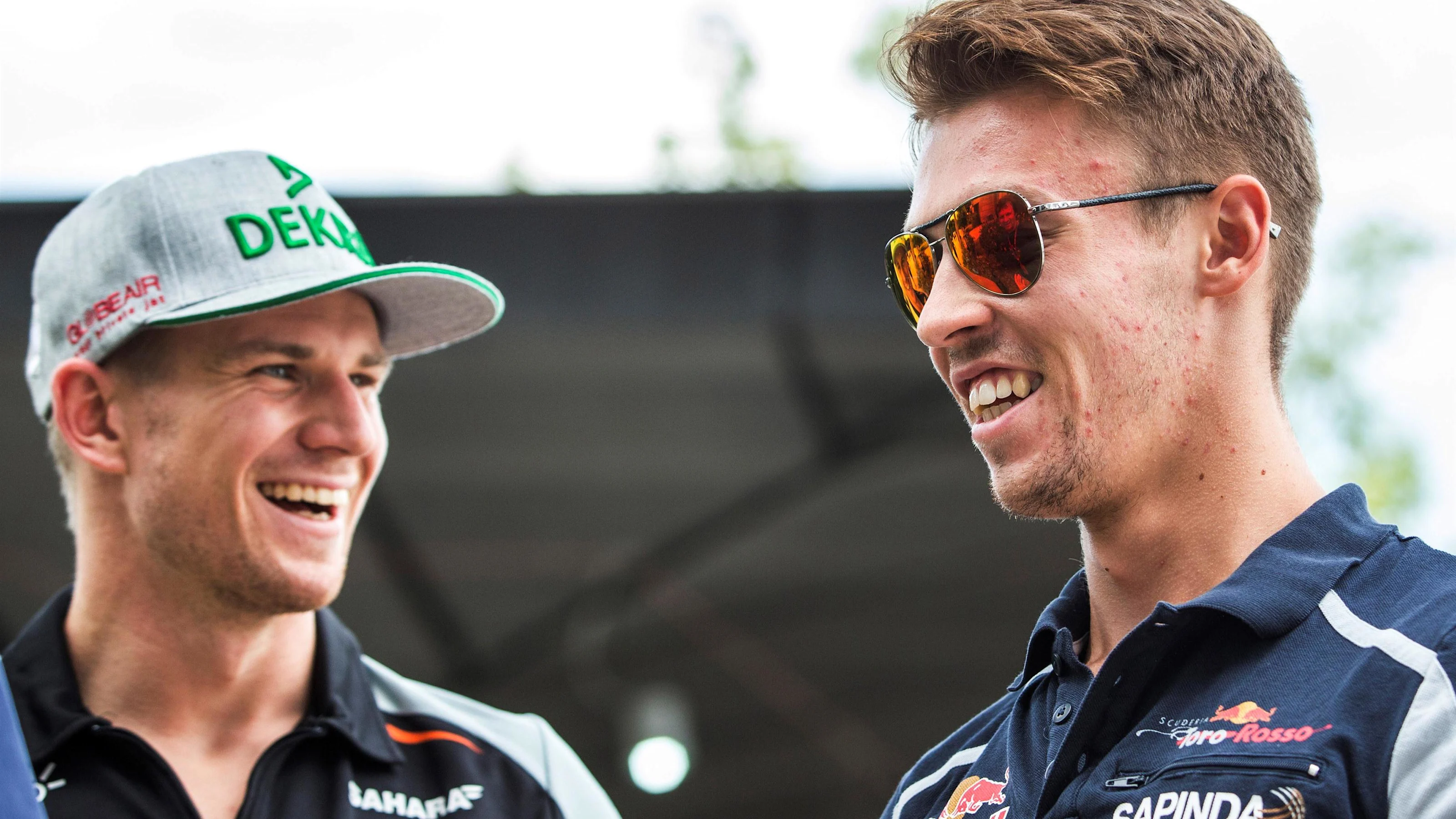 Nico Hulkenberg (GER) Force India F1 and Daniil Kvyat (RUS) Scuderia Toro Rosso at Formula One