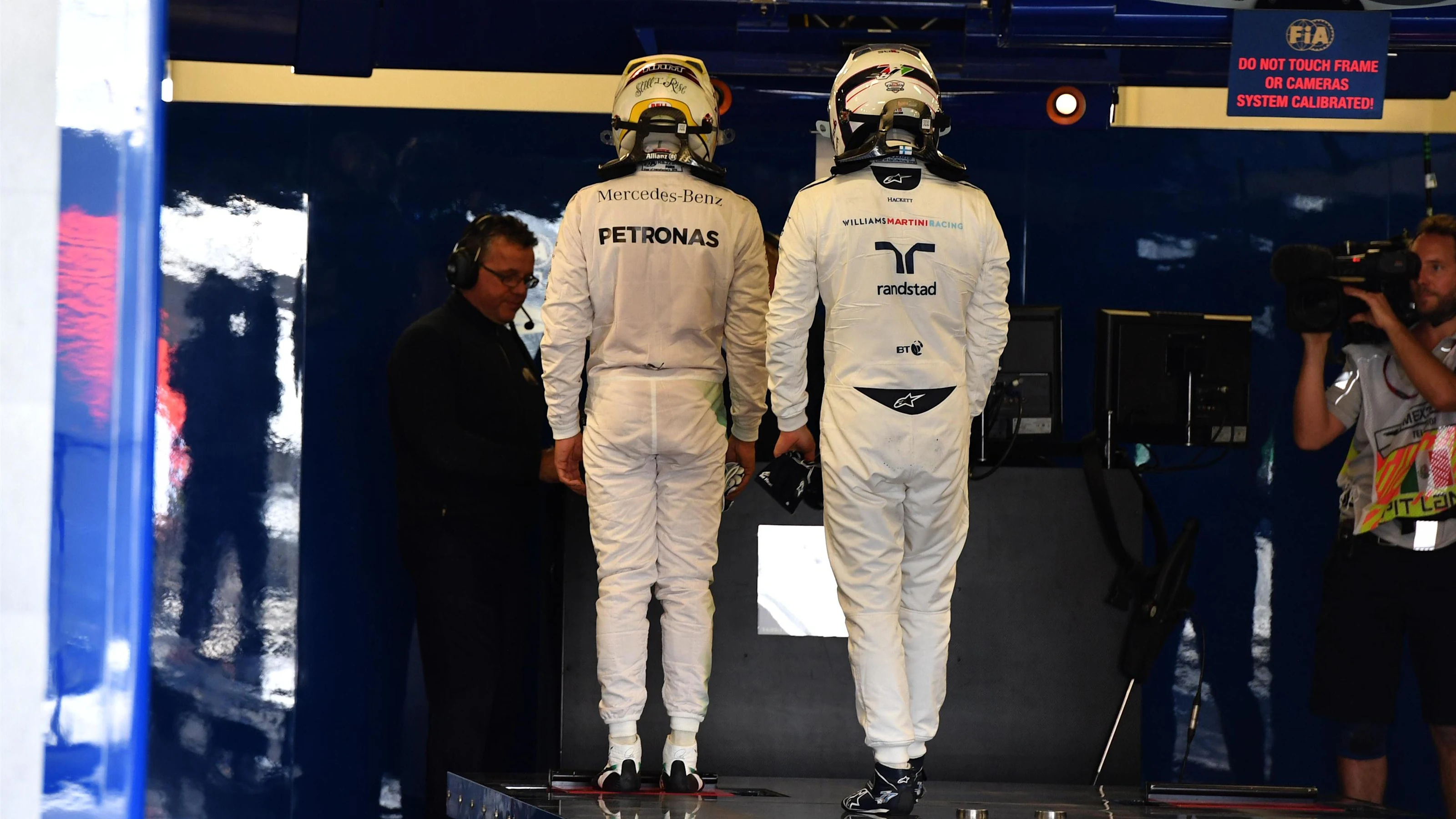 Lewis Hamilton (GBR) Mercedes AMG F1 and Valtteri Bottas (FIN) Williams in parc ferme at Formula