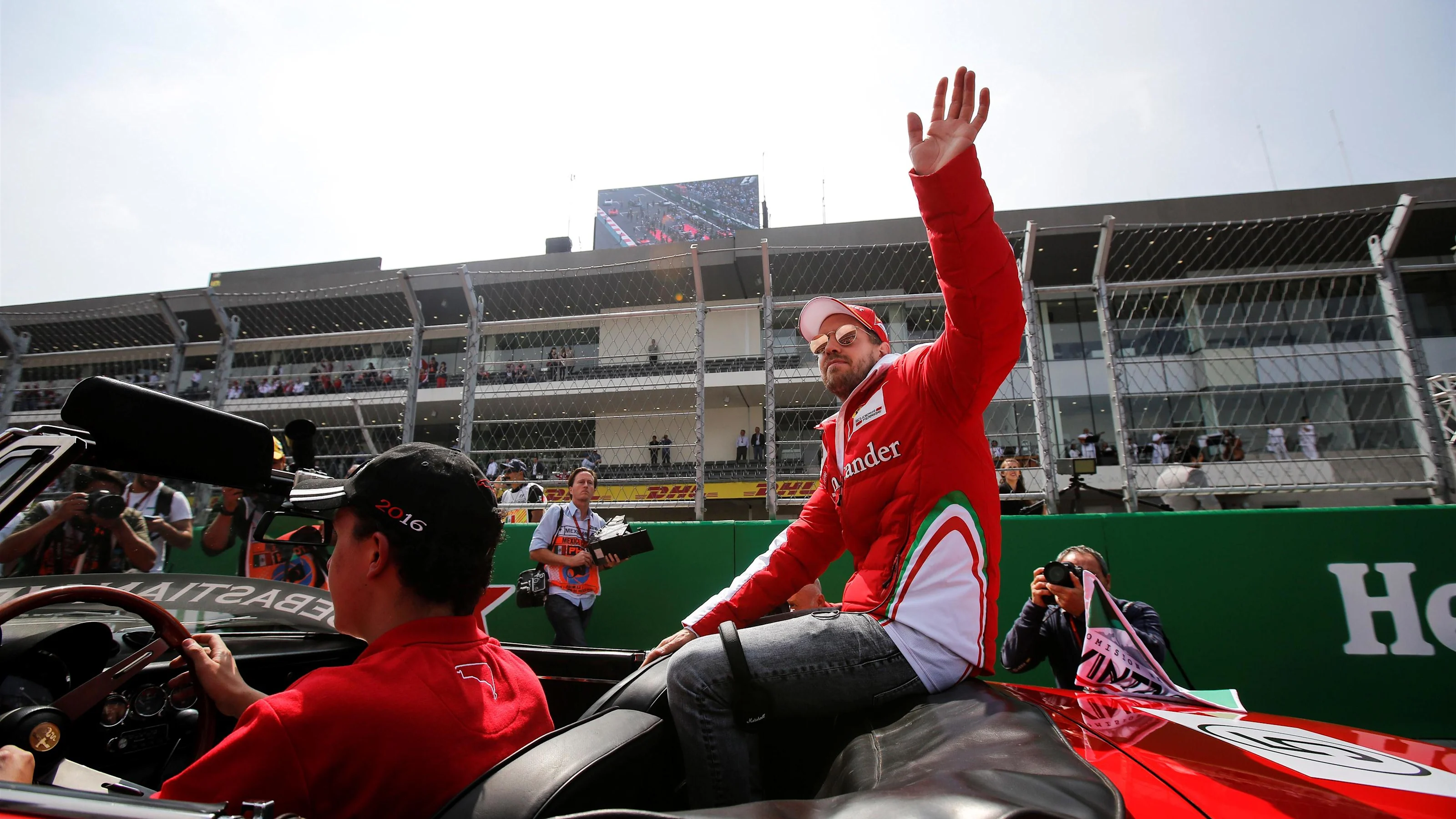 Sebastian Vettel (GER) Ferrari on the drivers parade at Formula One World Championship, Rd19,