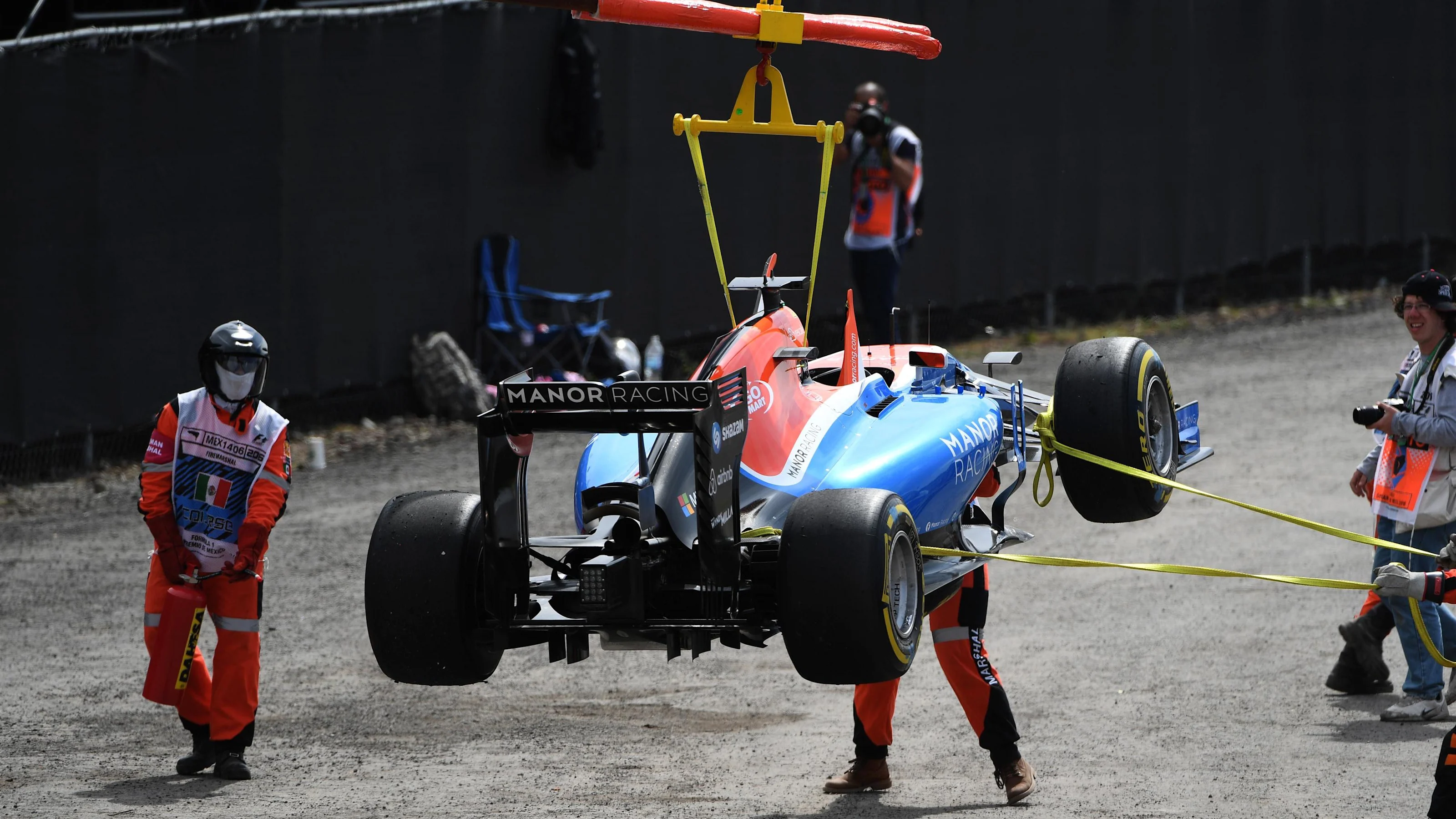 The crashed car of race retiree Pascal Wehrlein (GER) Manor Racing MRT05 is recovered at Formula