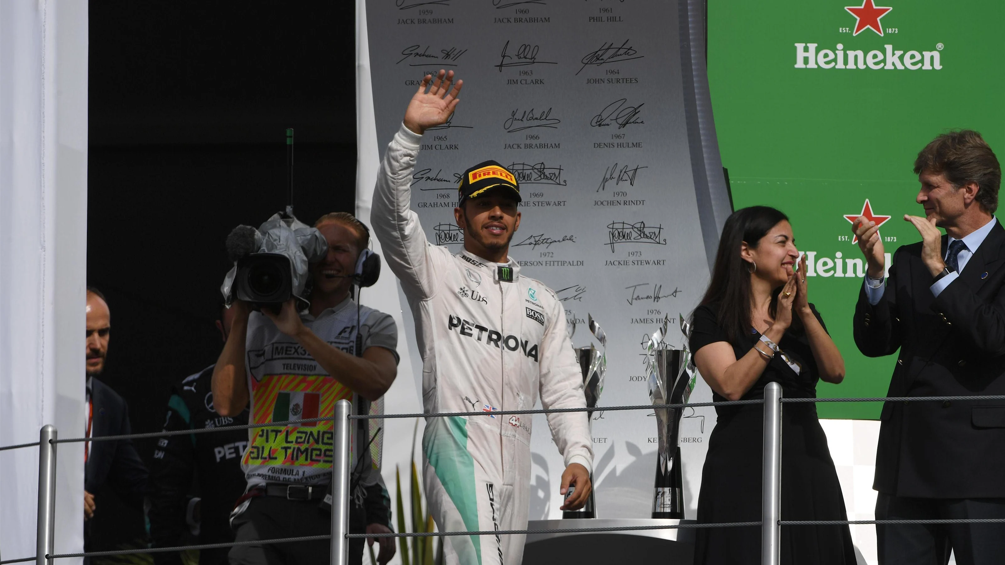 Race winner Lewis Hamilton (GBR) Mercedes AMG F1 celebrates on the podium at Formula One World
