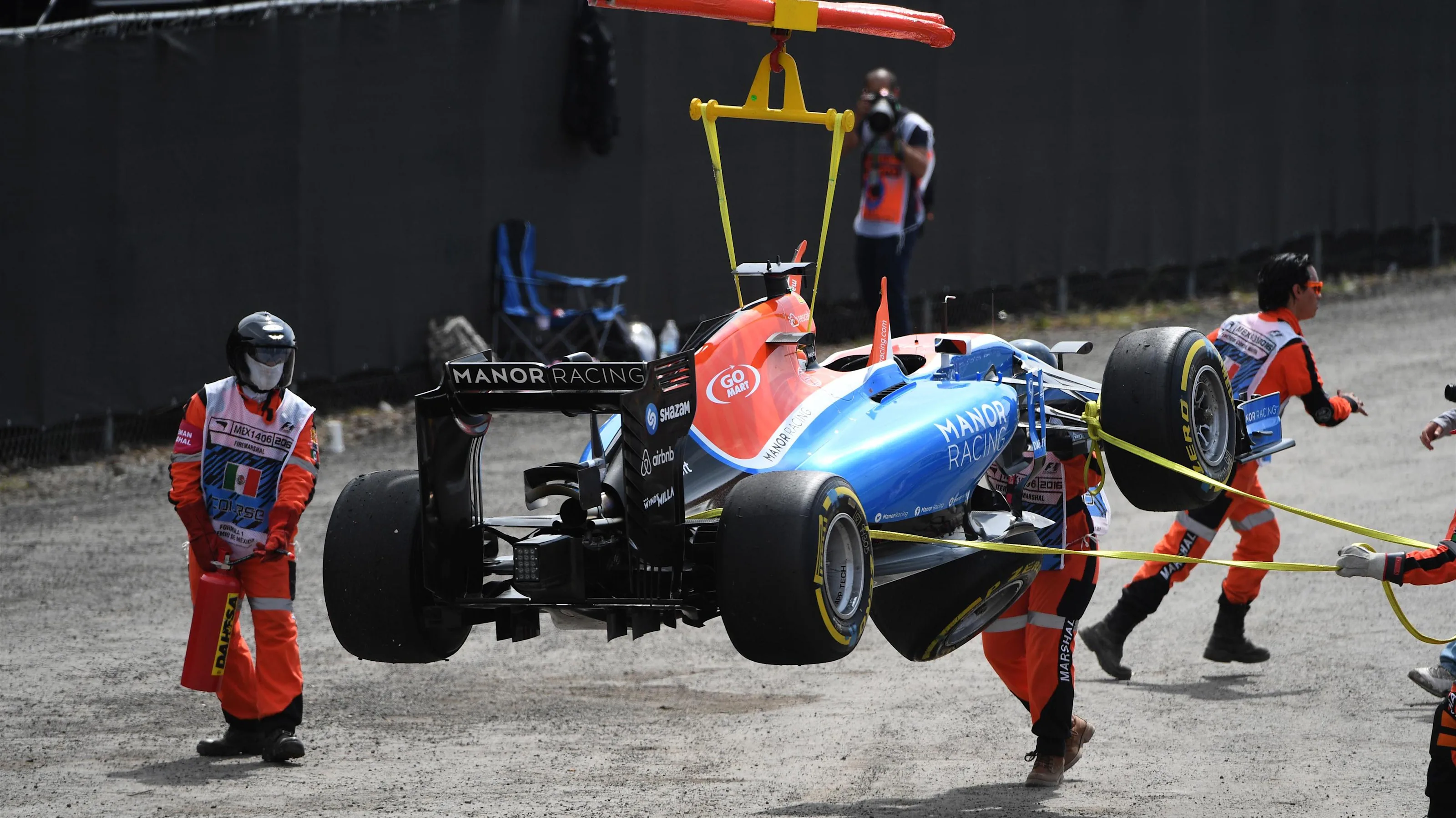 The car of race retiree Pascal Wehrlein (GER) Manor Racing MRT05 is recovered at Formula One World