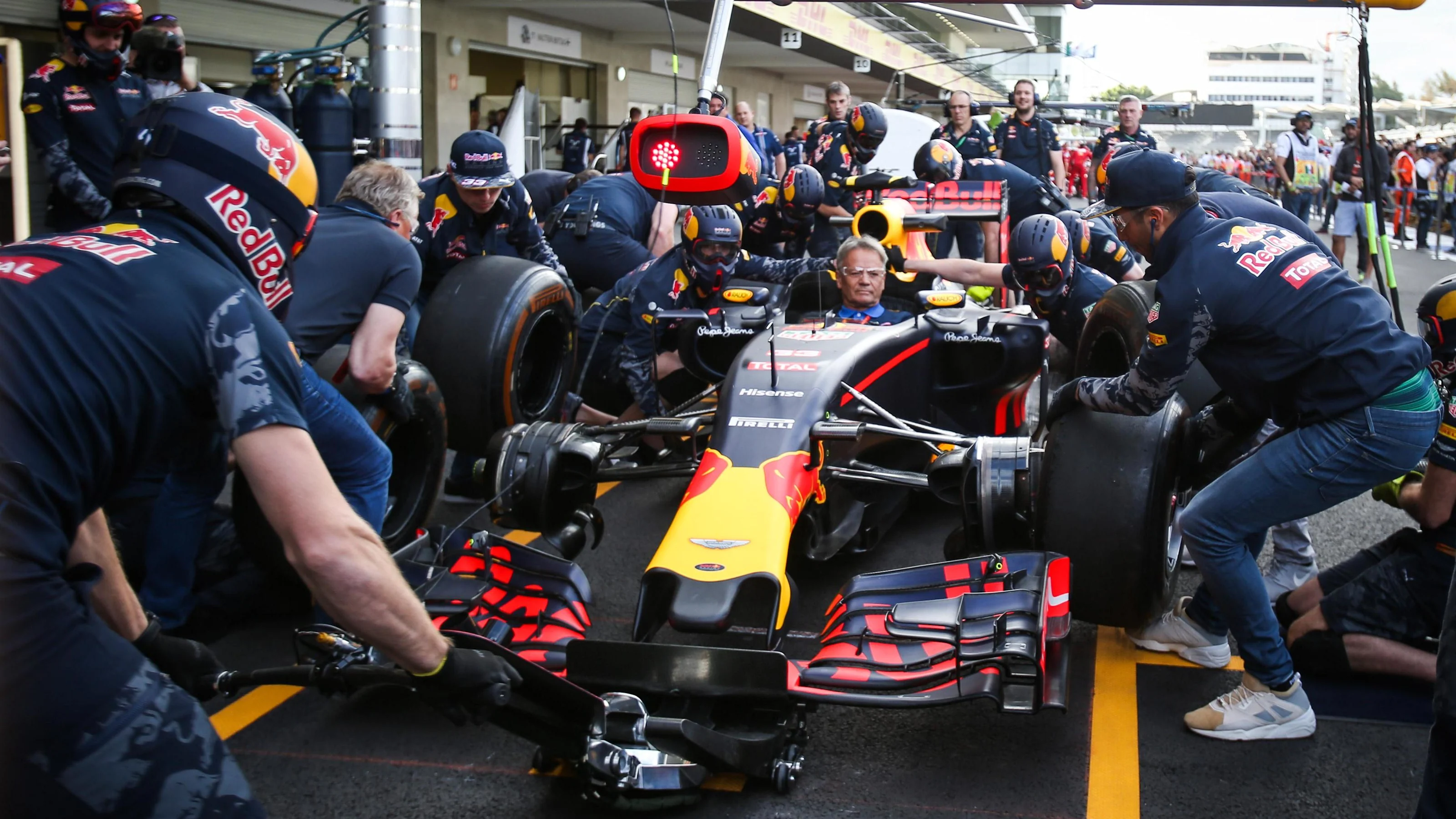 Daniel Ricciardo (AUS) Red Bull Racing and pit stop practice at Formula One World Championship,