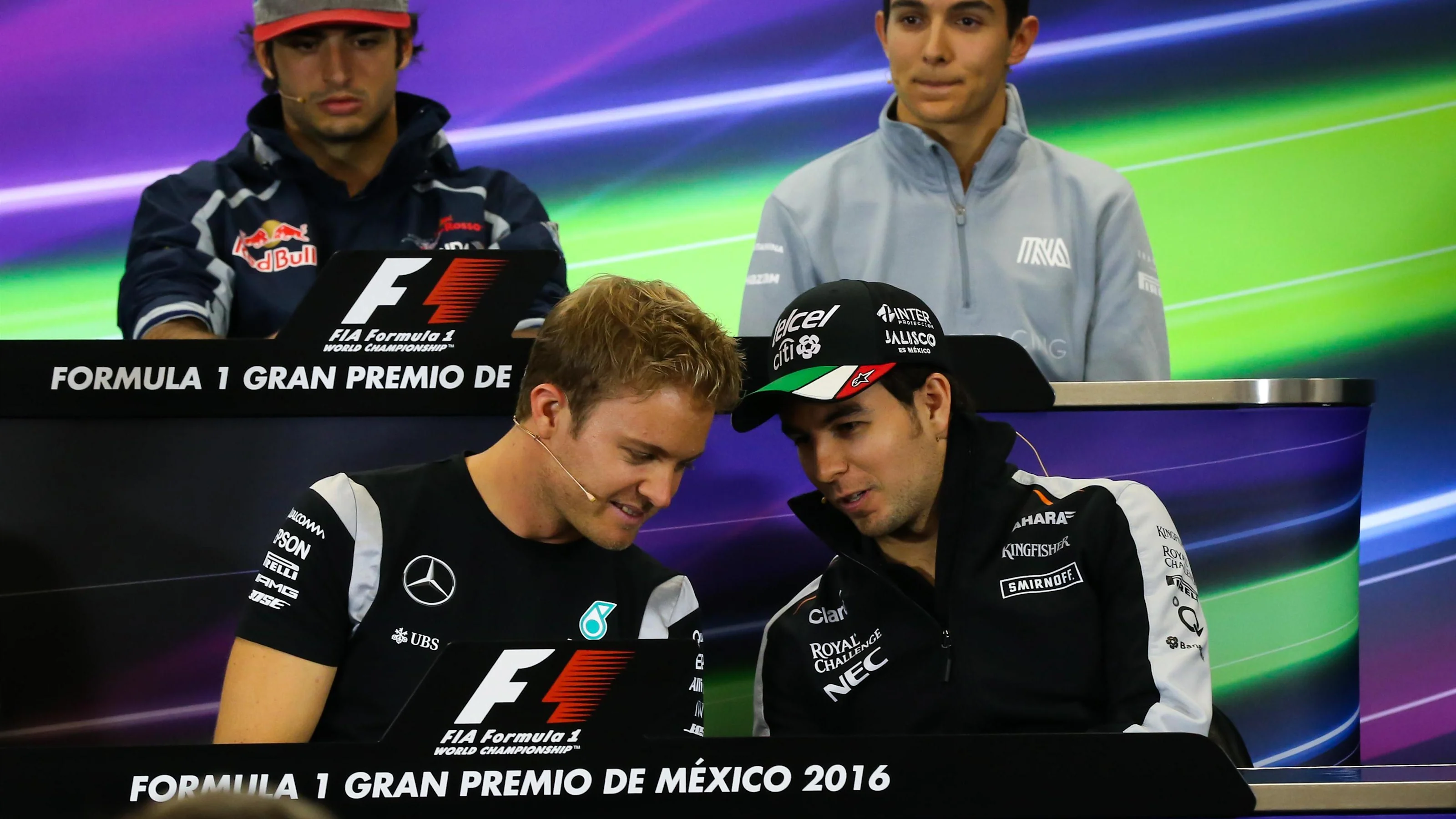 Nico Rosberg (GER) Mercedes AMG F1 and Sergio Perez (MEX) Force India in the Press Conference at