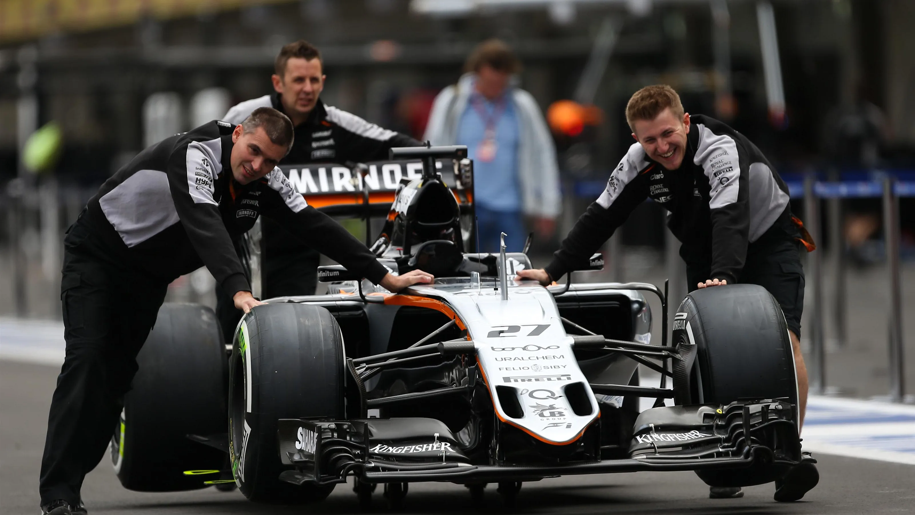 Force India mechanics with Force India VJM09 in pit lane at Formula One World Championship, Rd19,